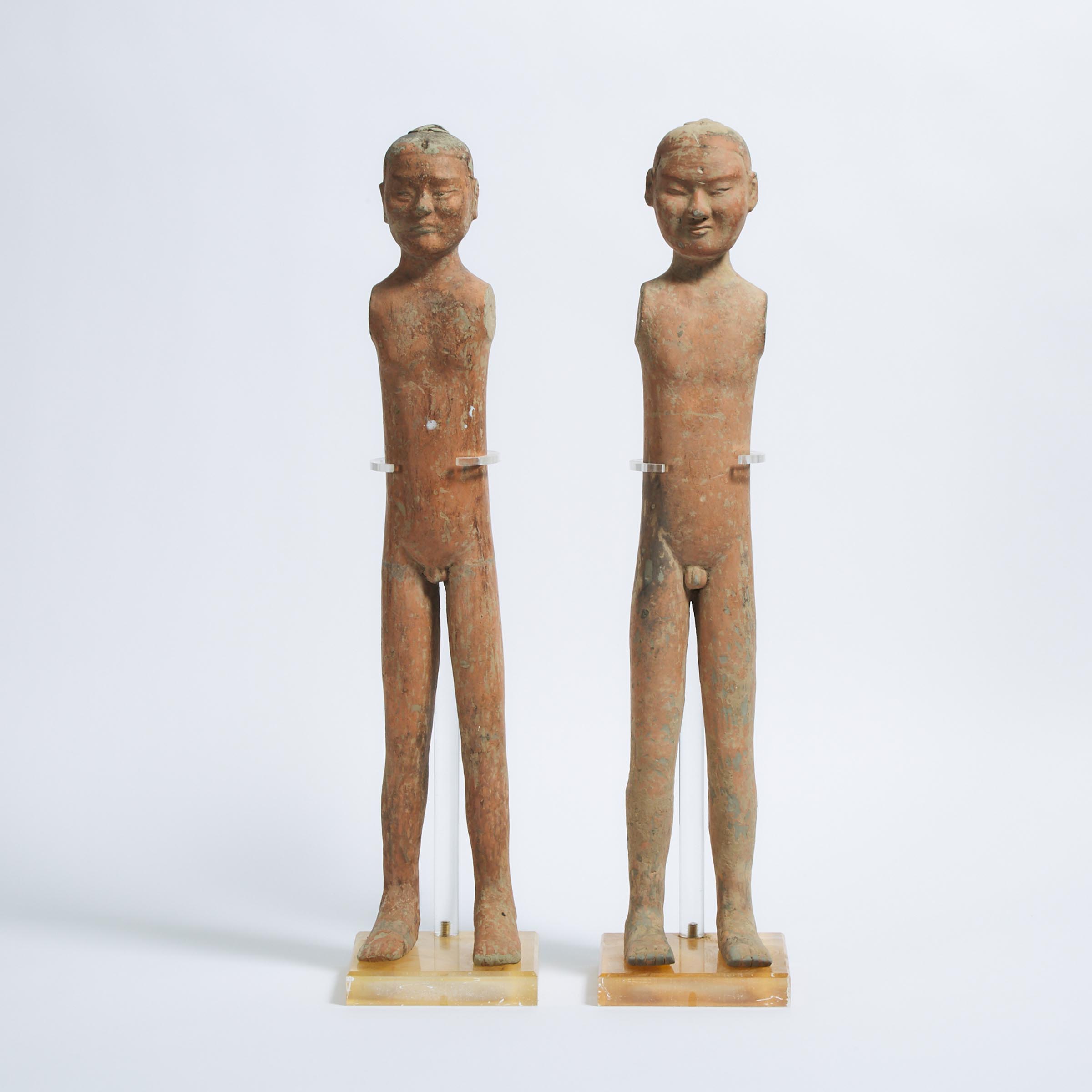 A Pair of Tall Pottery Male Warrior Figures, Han Dynasty (206 BC - AD 220)