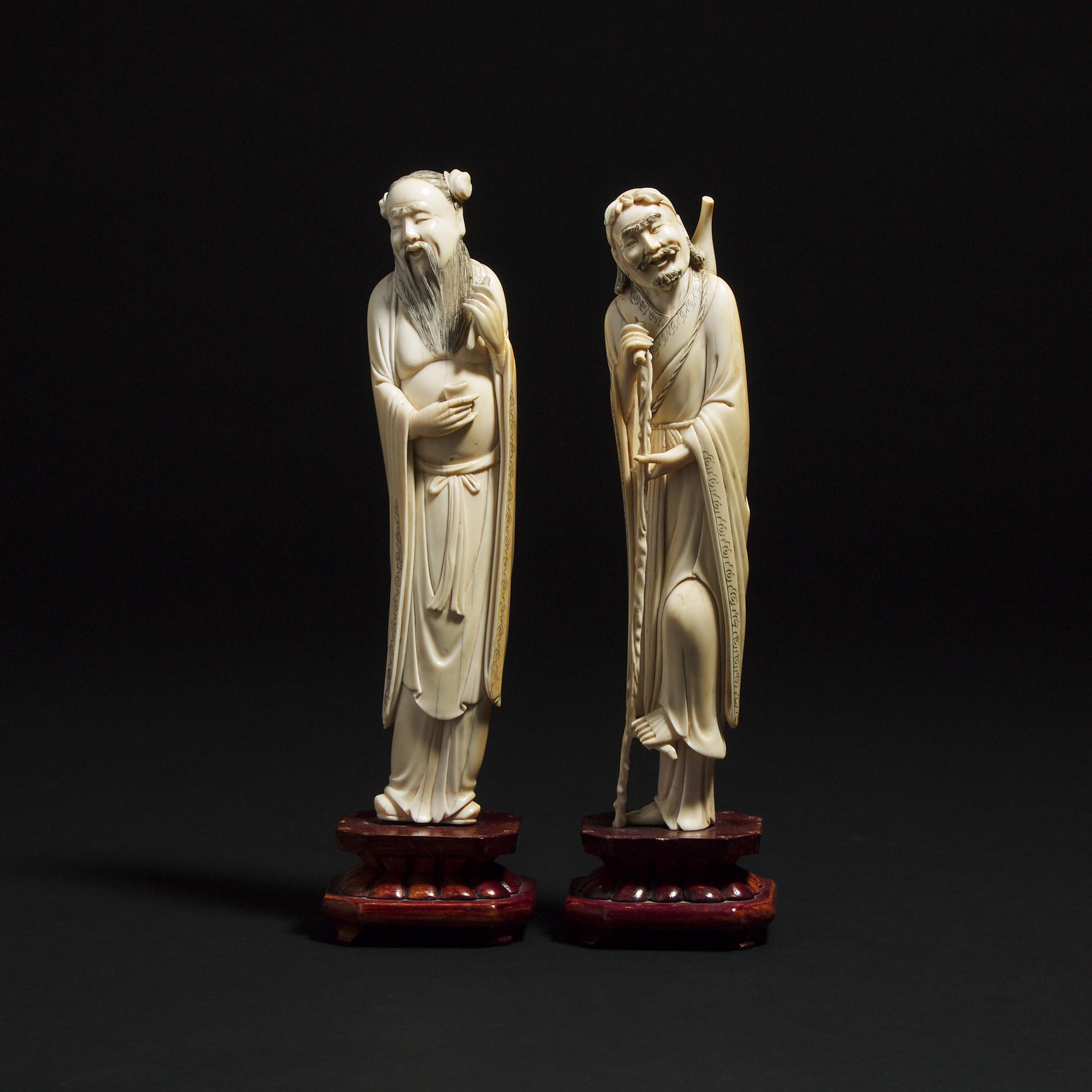 Two Ivory Carved Figures of Daoist Immortals, 19th Century 