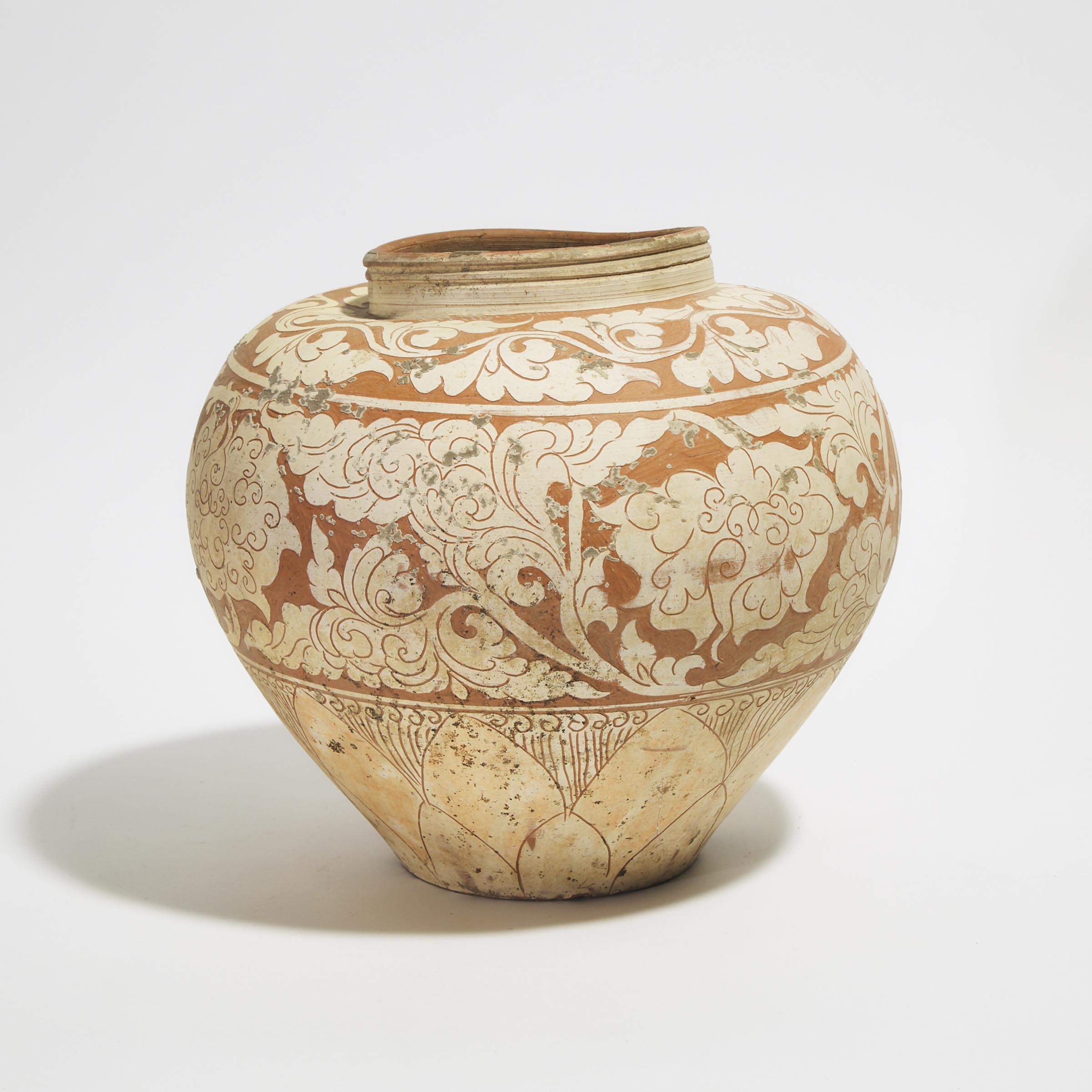 An Unusual Cizhou-Type Carved 'Floral' Jar, Yuan/Ming Dynasty