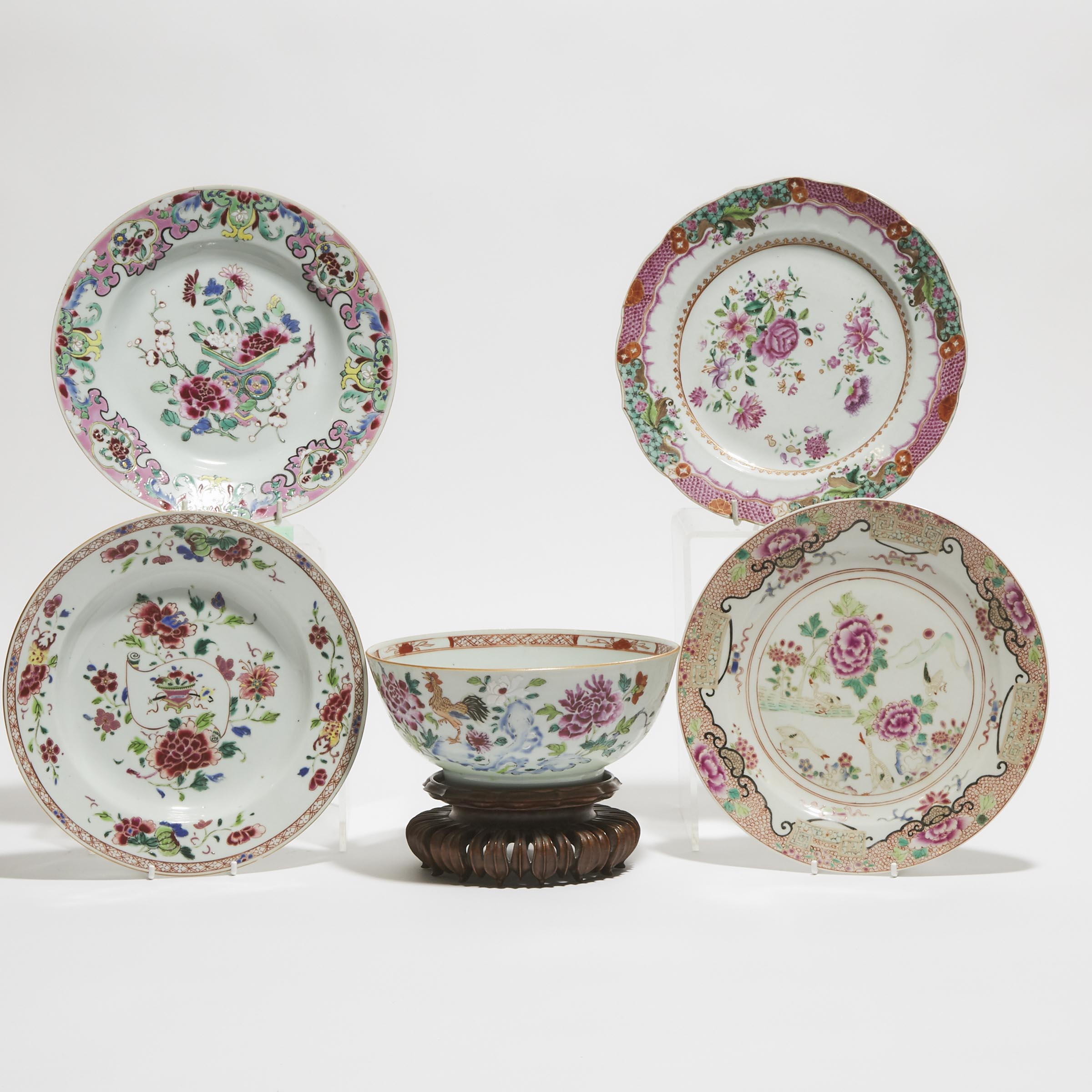 A Group of Four Famille Rose Plates, together with a Punch Bowl, Qianlong Period, 18th Century