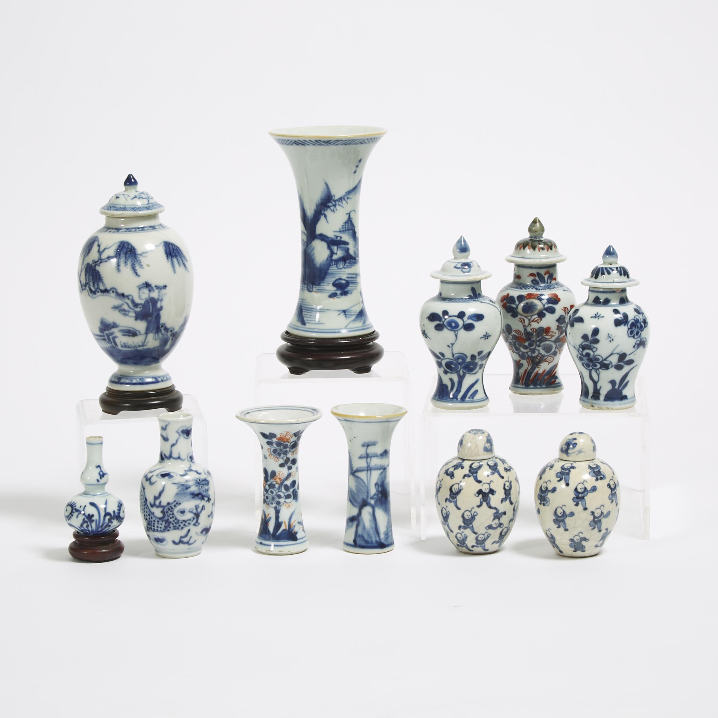 A Group of Eleven Miniature Blue and White Garnitures, 19th Century