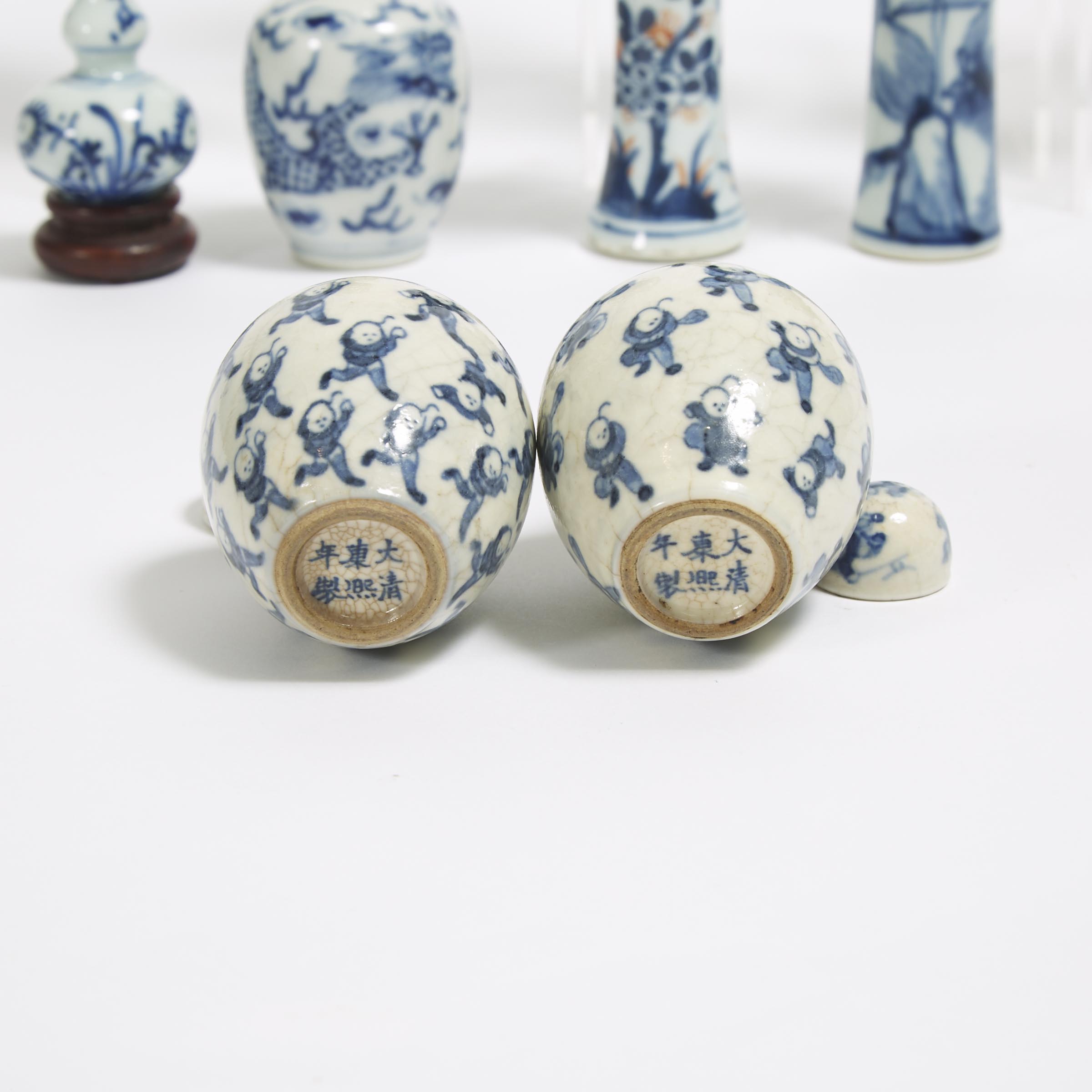 A Group of Eleven Miniature Blue and White Garnitures, 19th Century