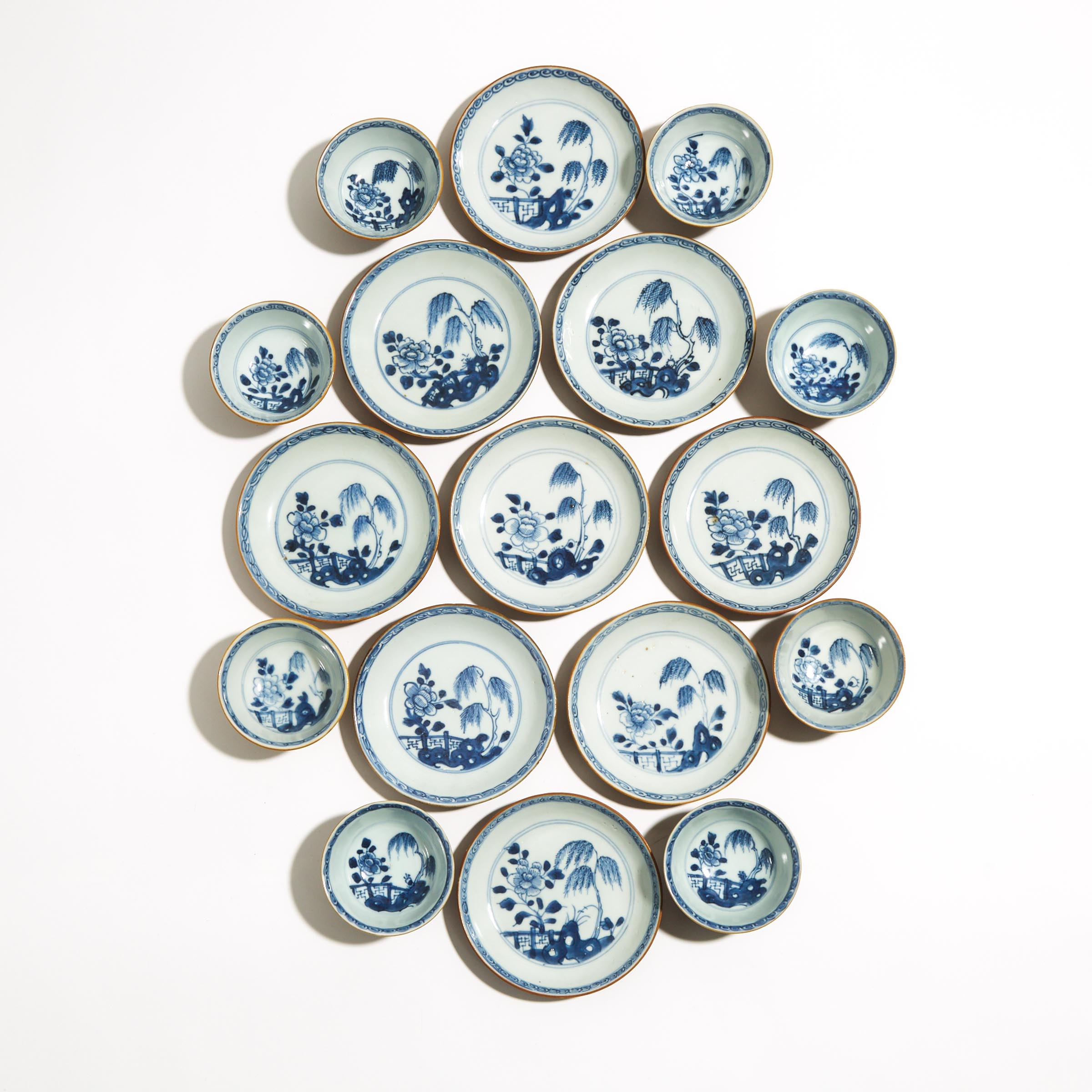 A Set of Seventeen 'Batavian Willow' Pattern Teabowls and Saucers from the Nanking Cargo, Qianlong Period, Circa 1750