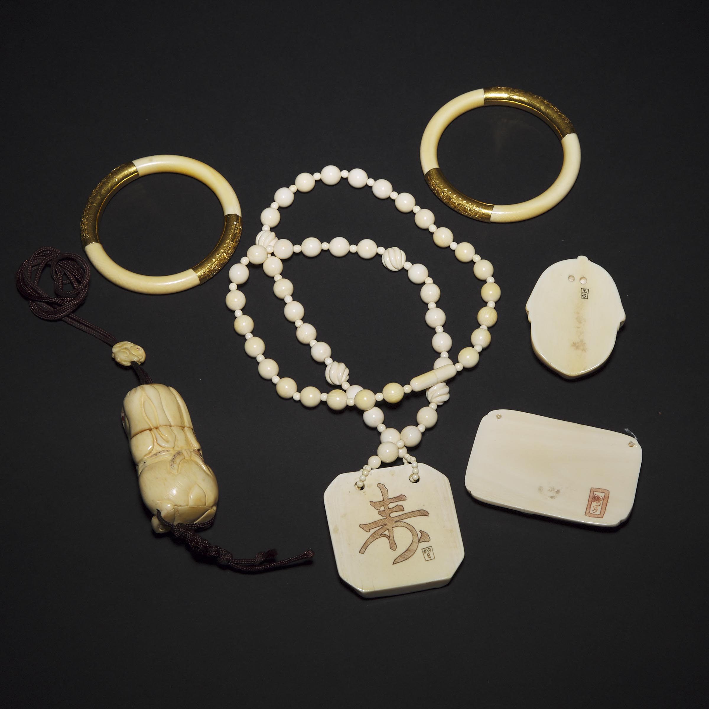A Group of Four Ivory and Bone Carvings, Together With Two Gold Mounted Bangles, 19th/20th Century