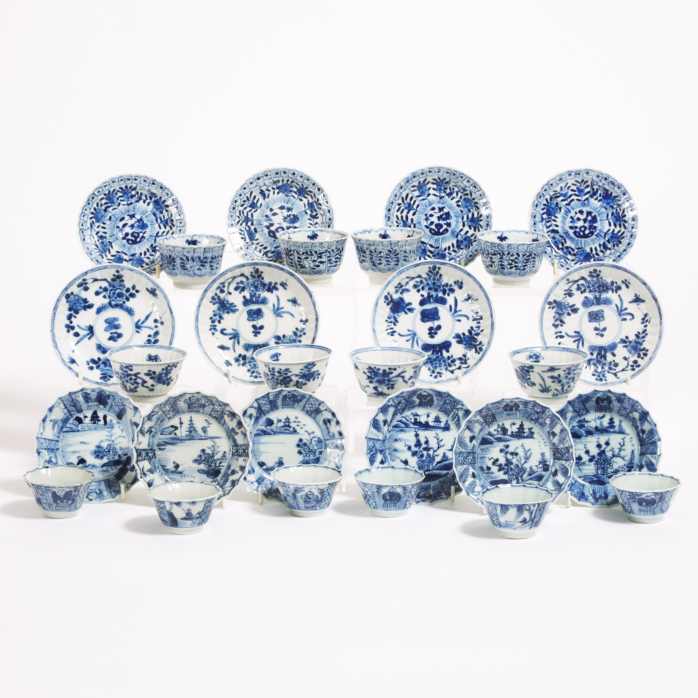 A Group of Twenty-Eight Blue and White Cups and Saucers, Kangxi Period (1662-1722)