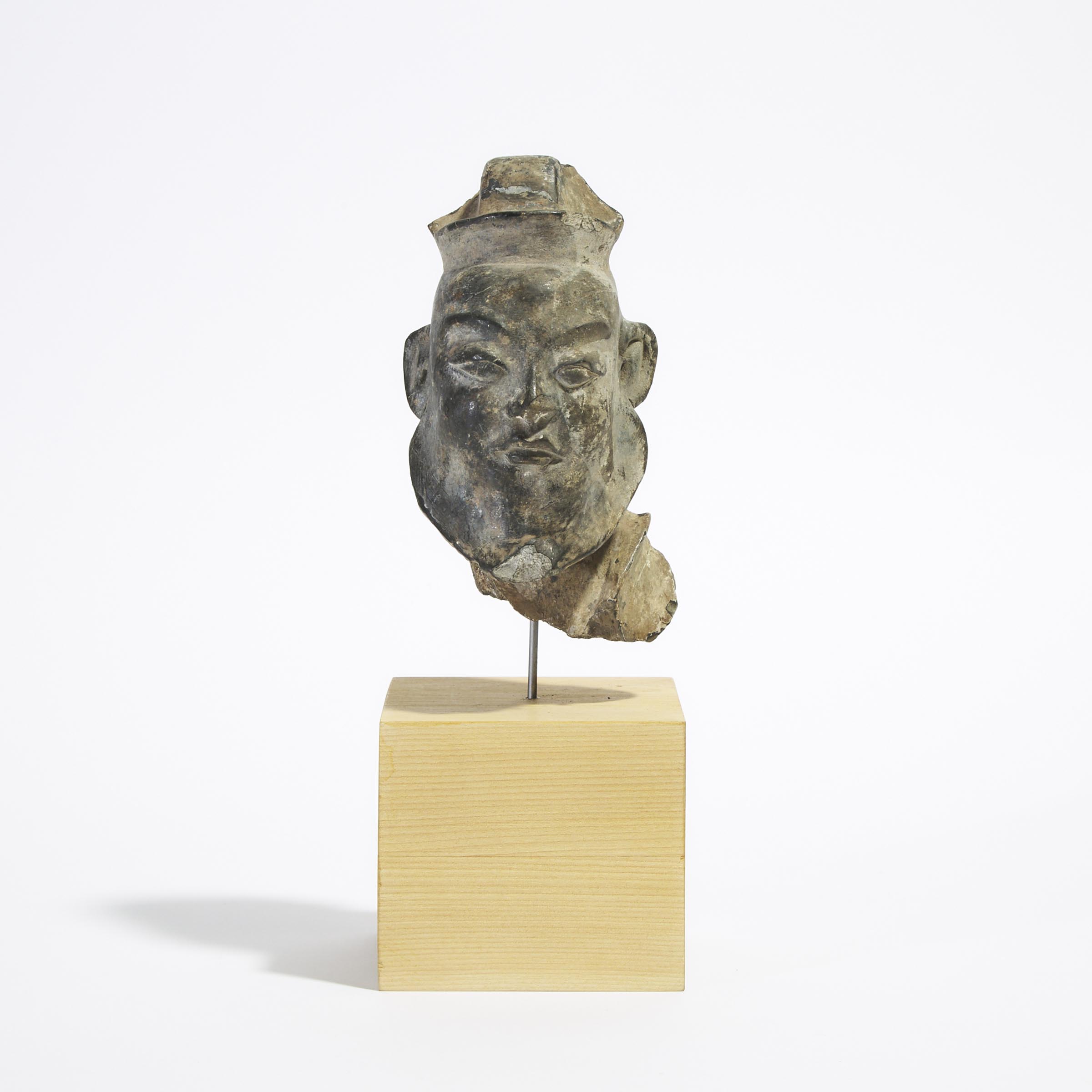 A Grey Terracotta Head of an Official, Possibly Tang Dynasty (AD 618-907)