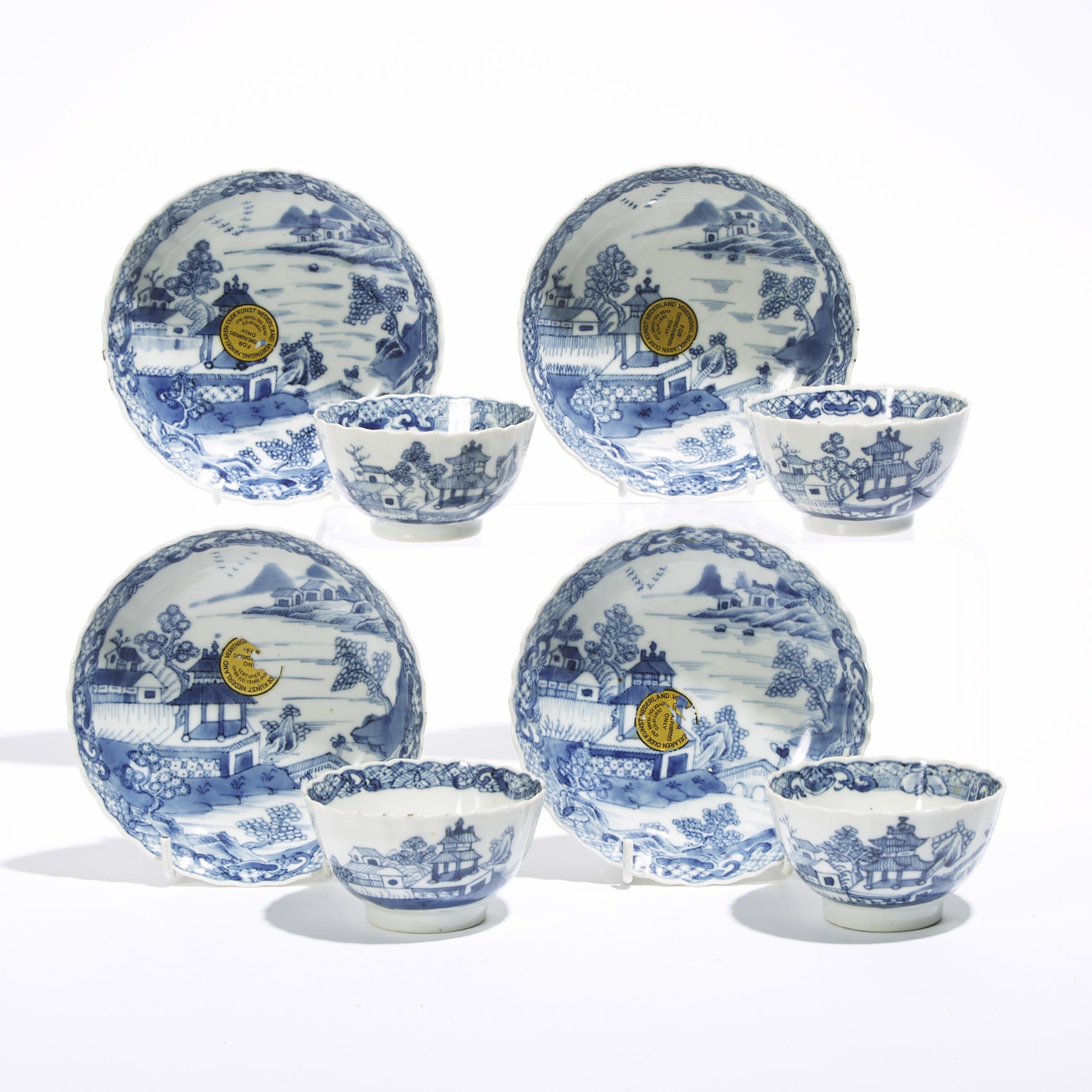A Set of Eight Blue and White Lobed Cups and Saucers, 18th Century