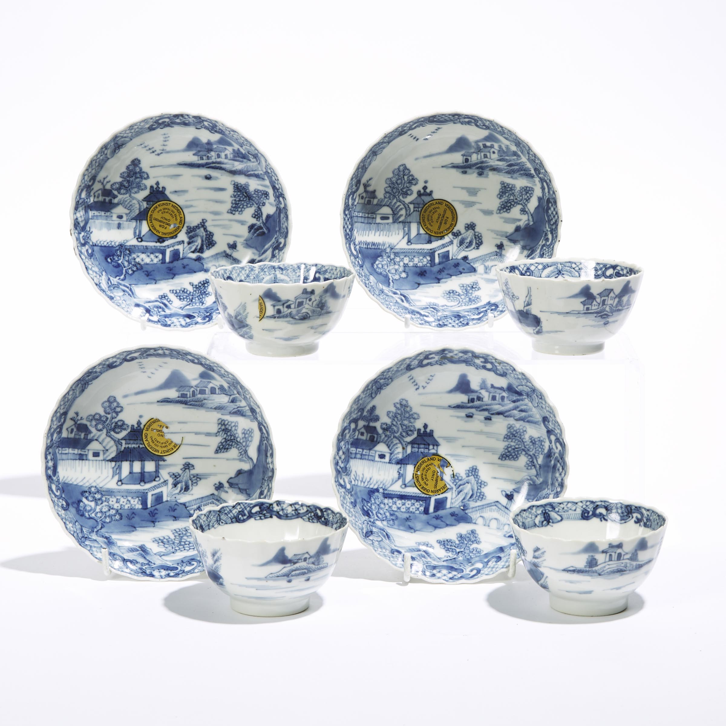 A Set of Eight Blue and White Lobed Cups and Saucers, 18th Century