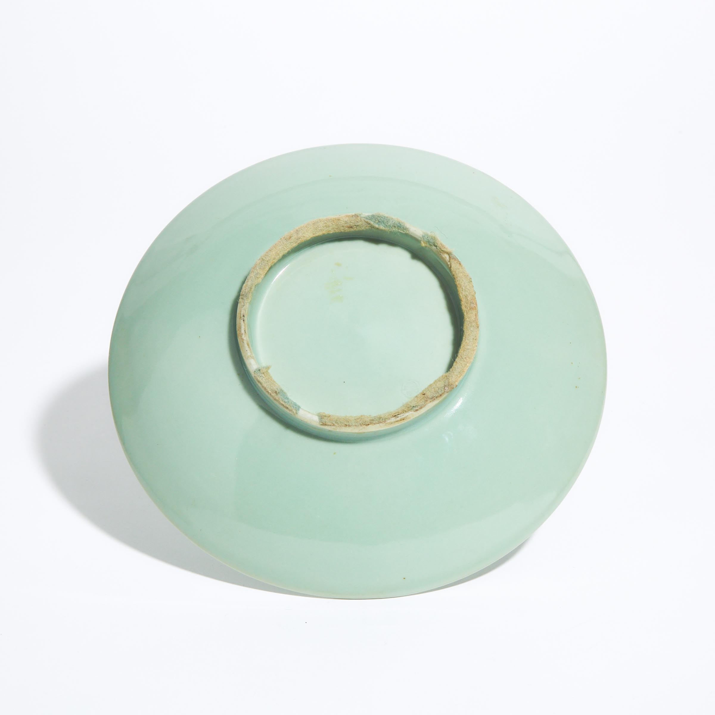 A Celadon-Glazed Slip-Decorated Dish