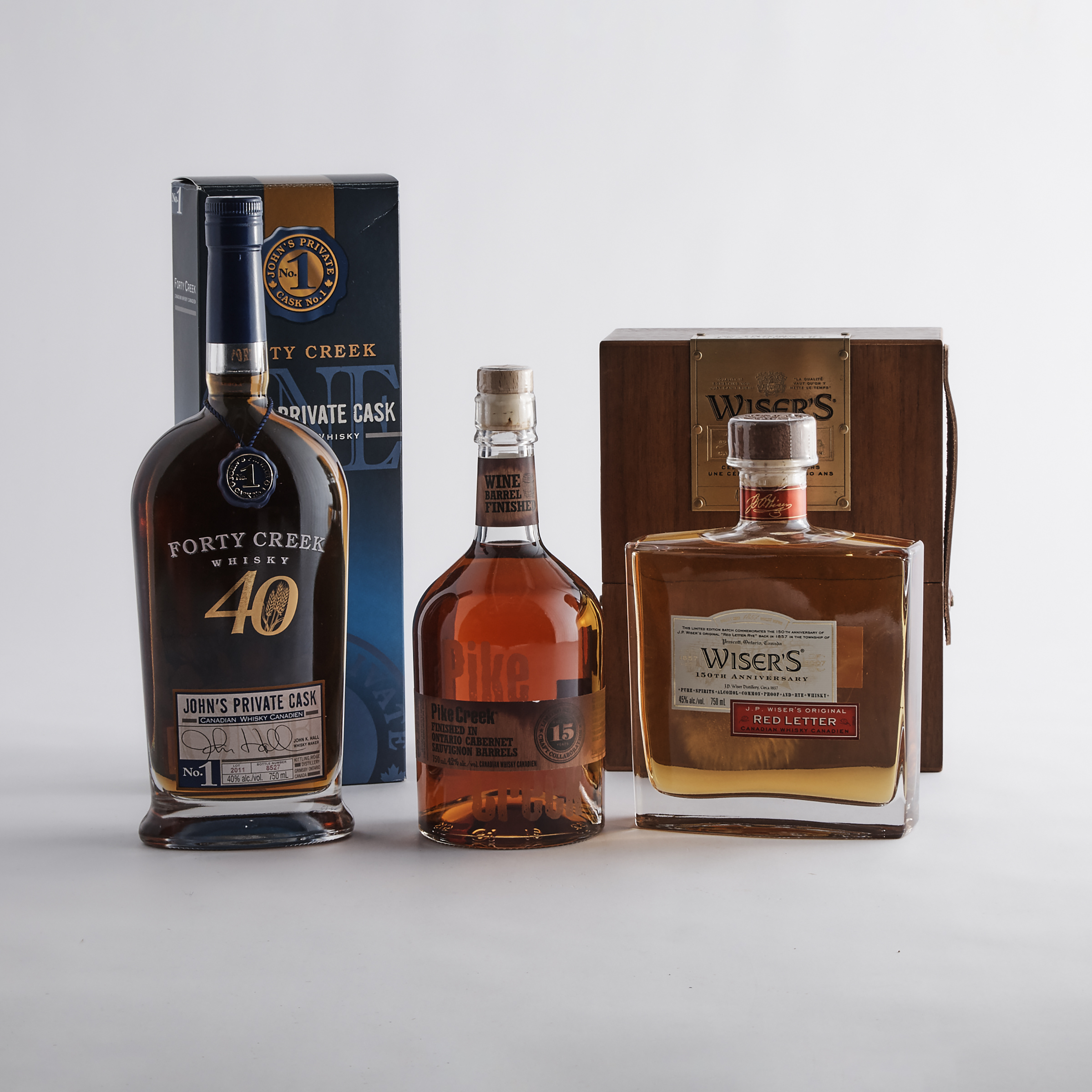 FORTY CREEK JOHN'S PRIVATE CASK CANADIAN WHISKY (ONE 750 ML)
PIKE CREEK CANADIAN WHISKY 15 YEARS (ONE 750 ML)
WISER'S RED LETTER CANADIAN WHISKY (ONE 750 ML)