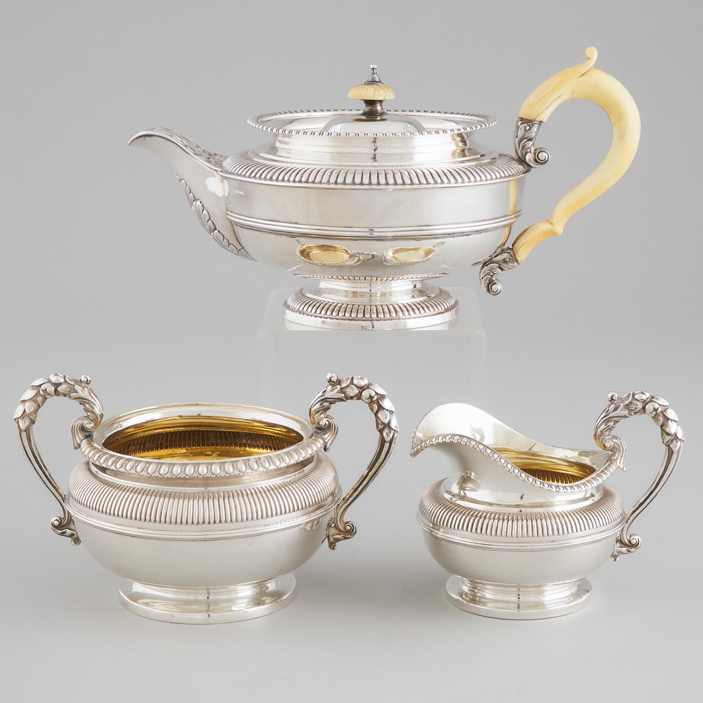 George IV Irish Silver Teapot, William Nolan for William Law, Dublin, 1825, and a Cream Jug and Sugar Basin, Benjamin Smith III, London, 1819