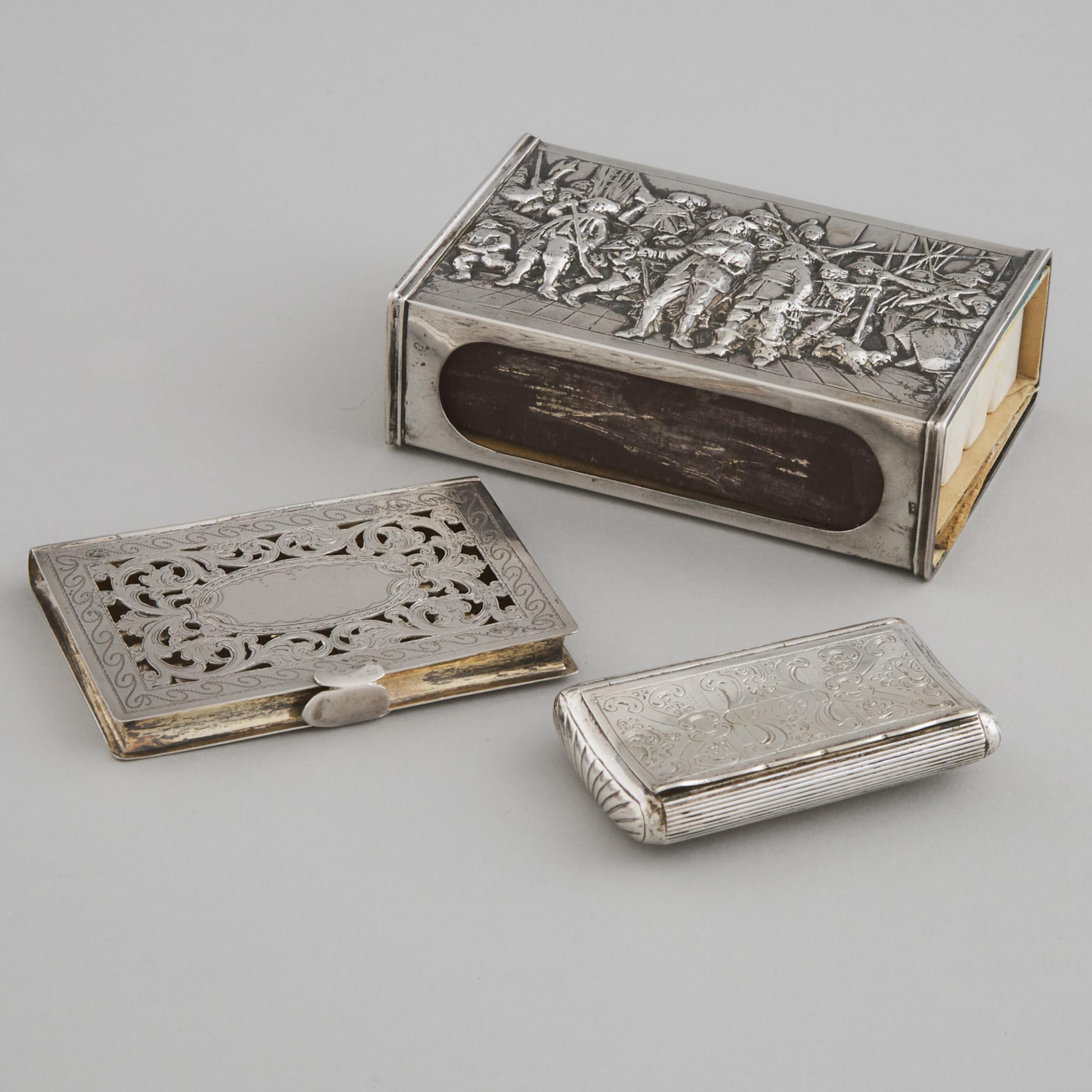 Dutch Silver Matchbox Cover, Pierced Book-Form Card Case and a Snuff Box, 19th/20th century