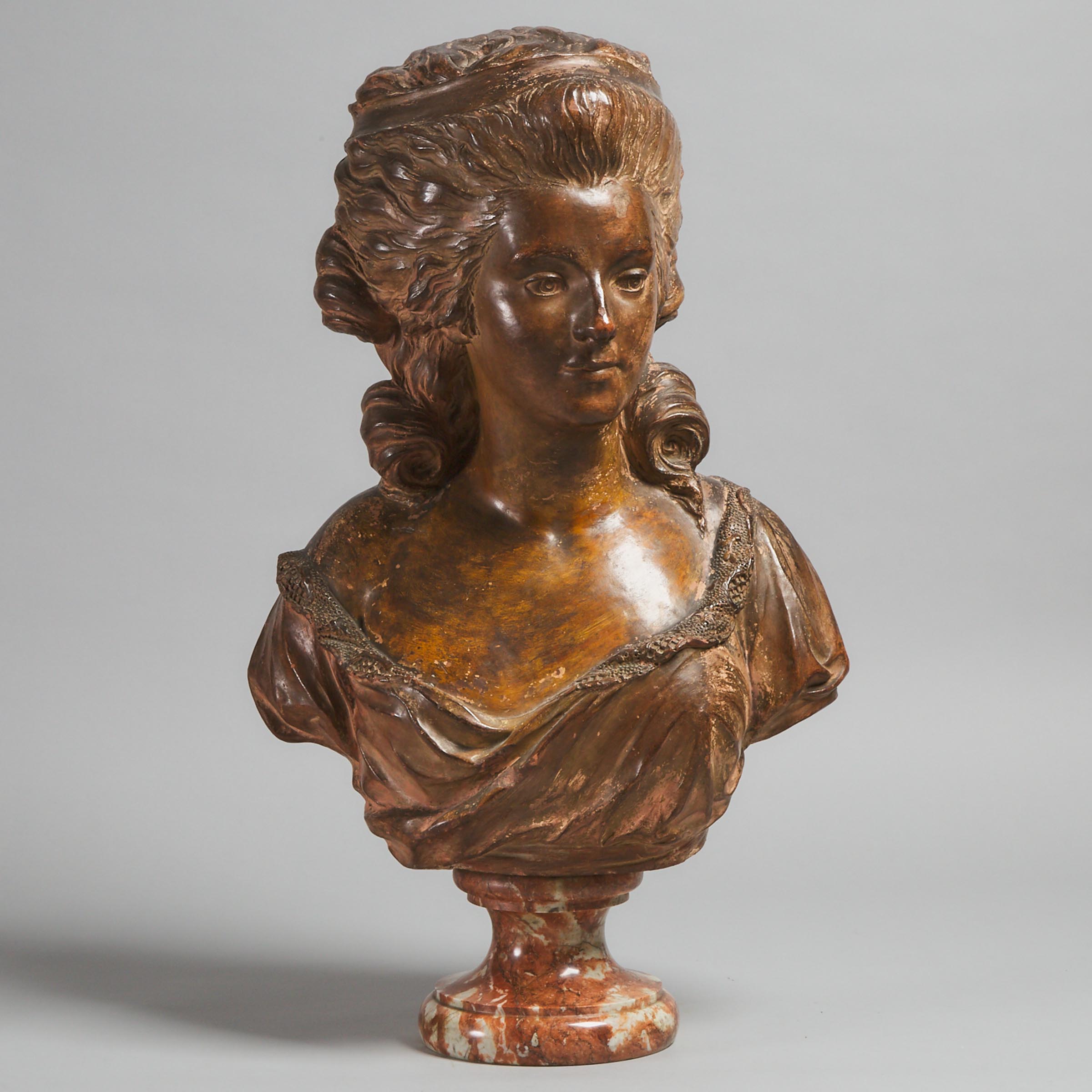 French Patinated Terra Cotta Bust of a Young Woman, 19th century