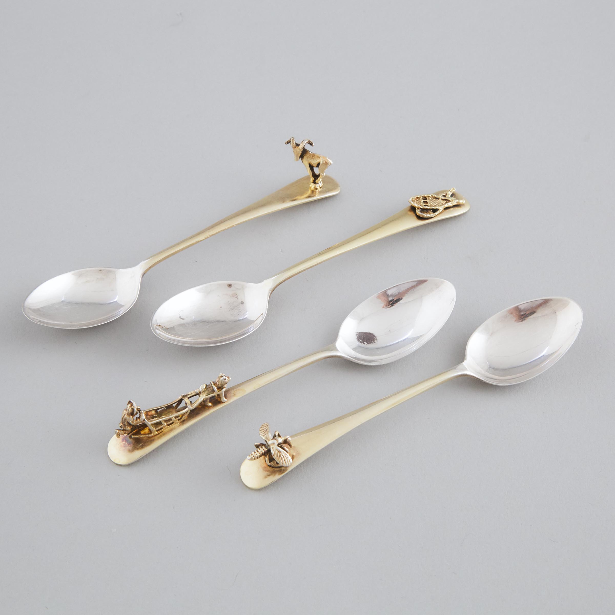 Four English Silver Parcel-Gilt Canadian-Interest Novelty Coffee Spoons, Cooper Bros. & Sons, Sheffield, 1971-73
