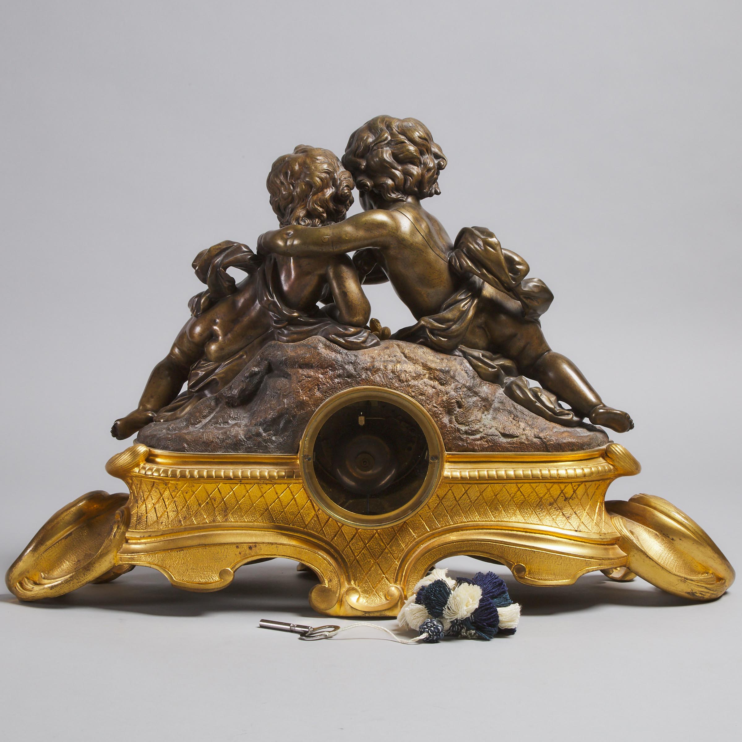 Large Napoleon III French Gilt and Patinated. Bronze Figural Mantel Clock, mid-late 19th century