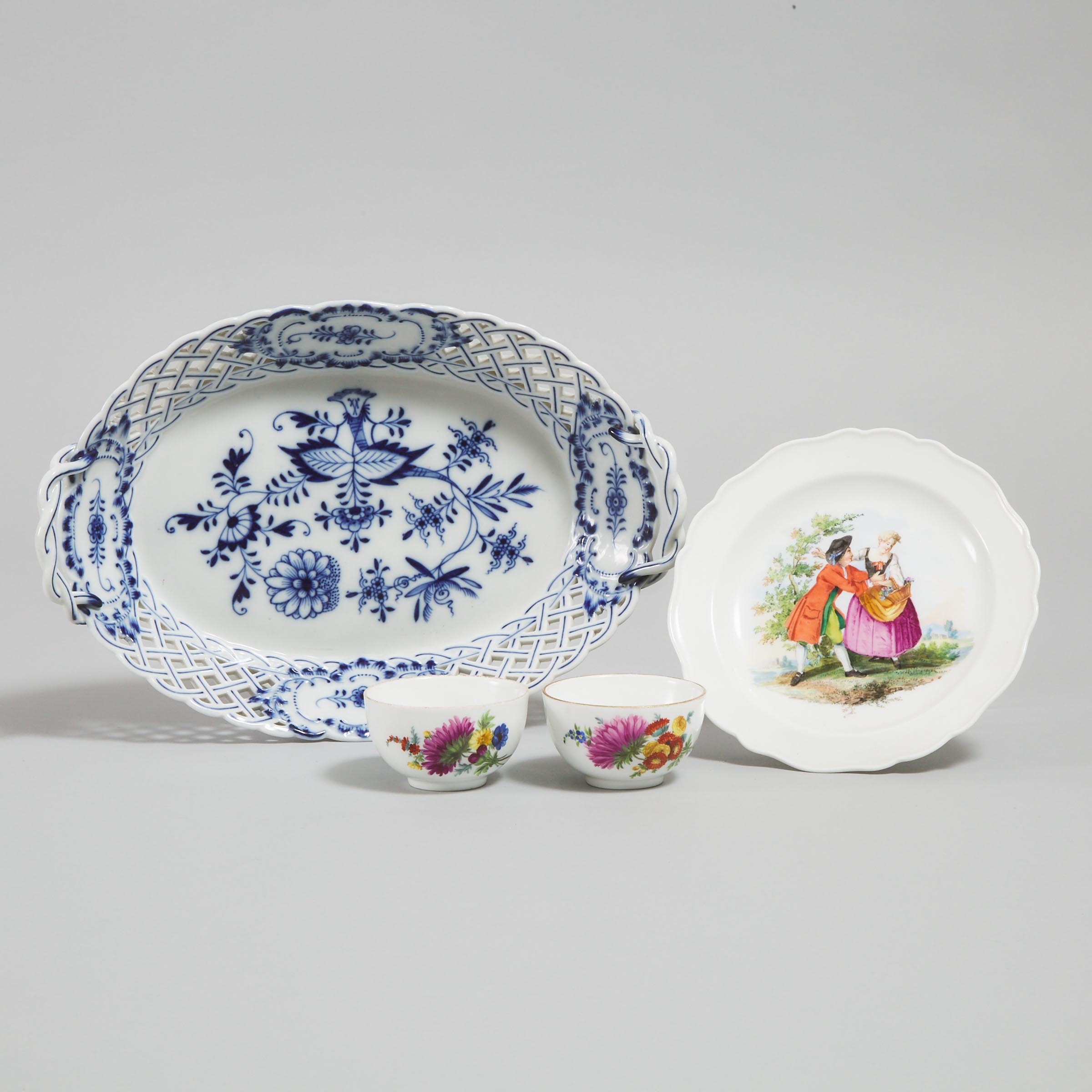 Meissen 'Onion' Pattern Reticulated Oval Basket, a Small Plate Painted with Figures and Two Floral Tea Bowls, 19th/early 20th century