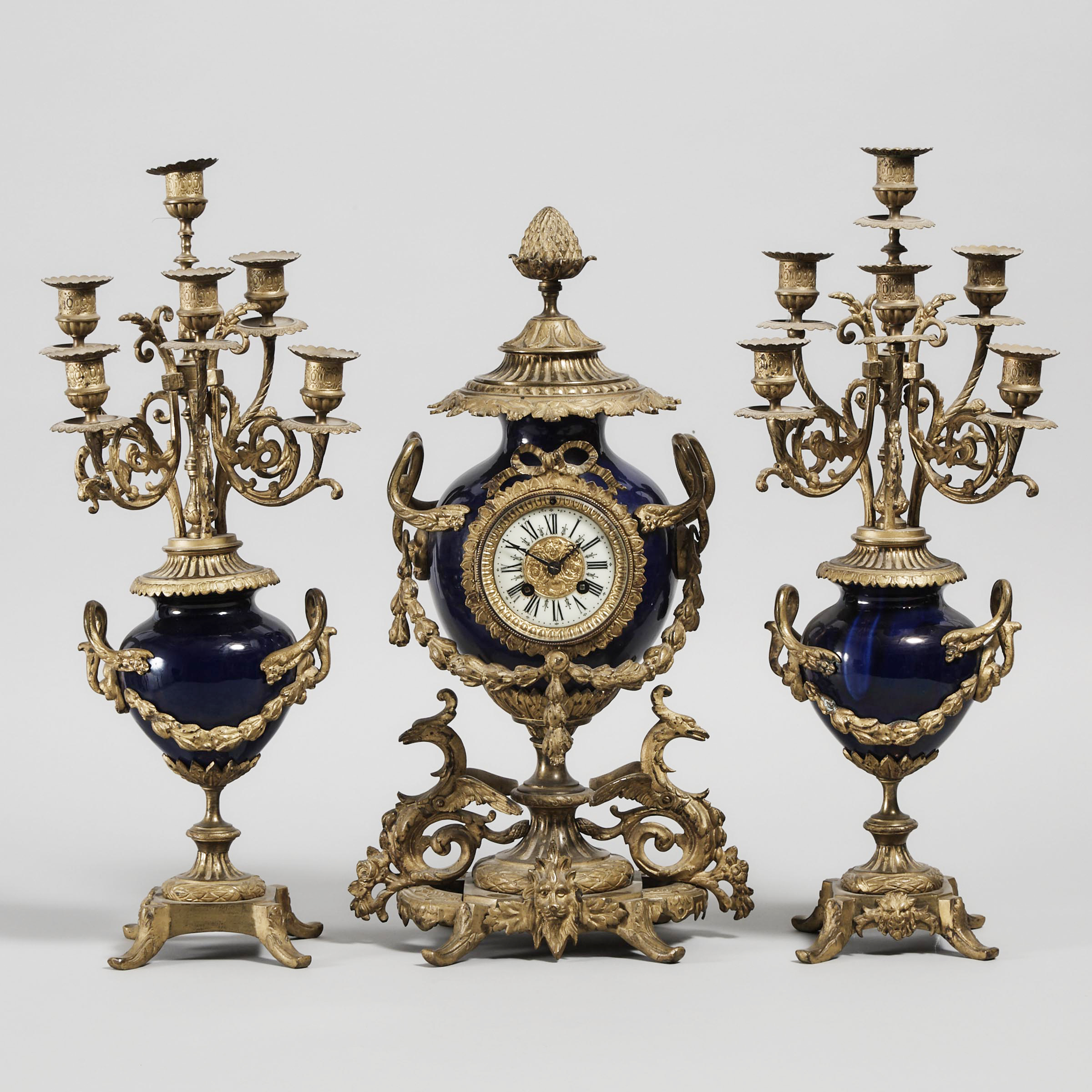 Three Piece Porcelain Mounted French Neo Grec Gilt Bronze Clock Garniture, c.1900