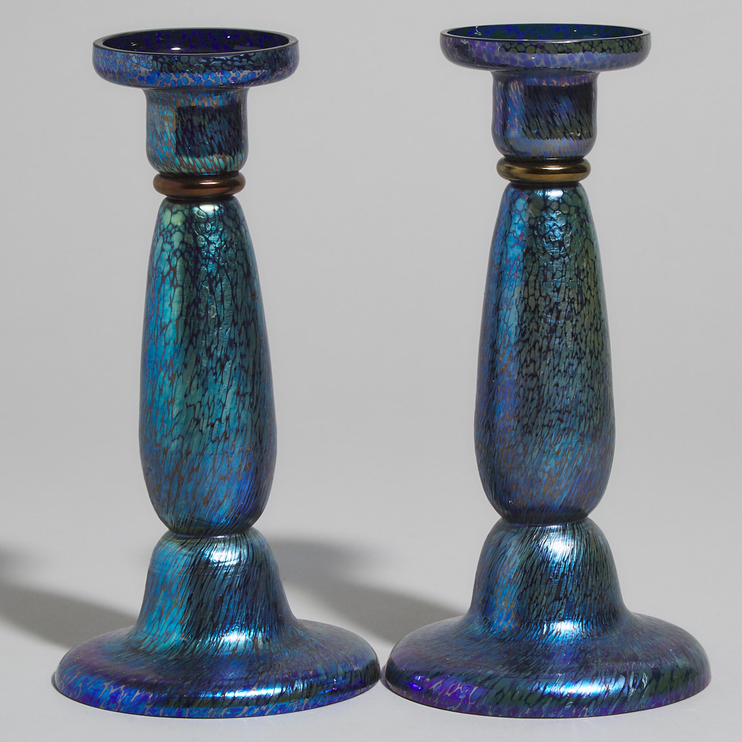Pair of Austrian 'Papillon' Style Iridescent Blue Glass Candlesticks, early 20th century