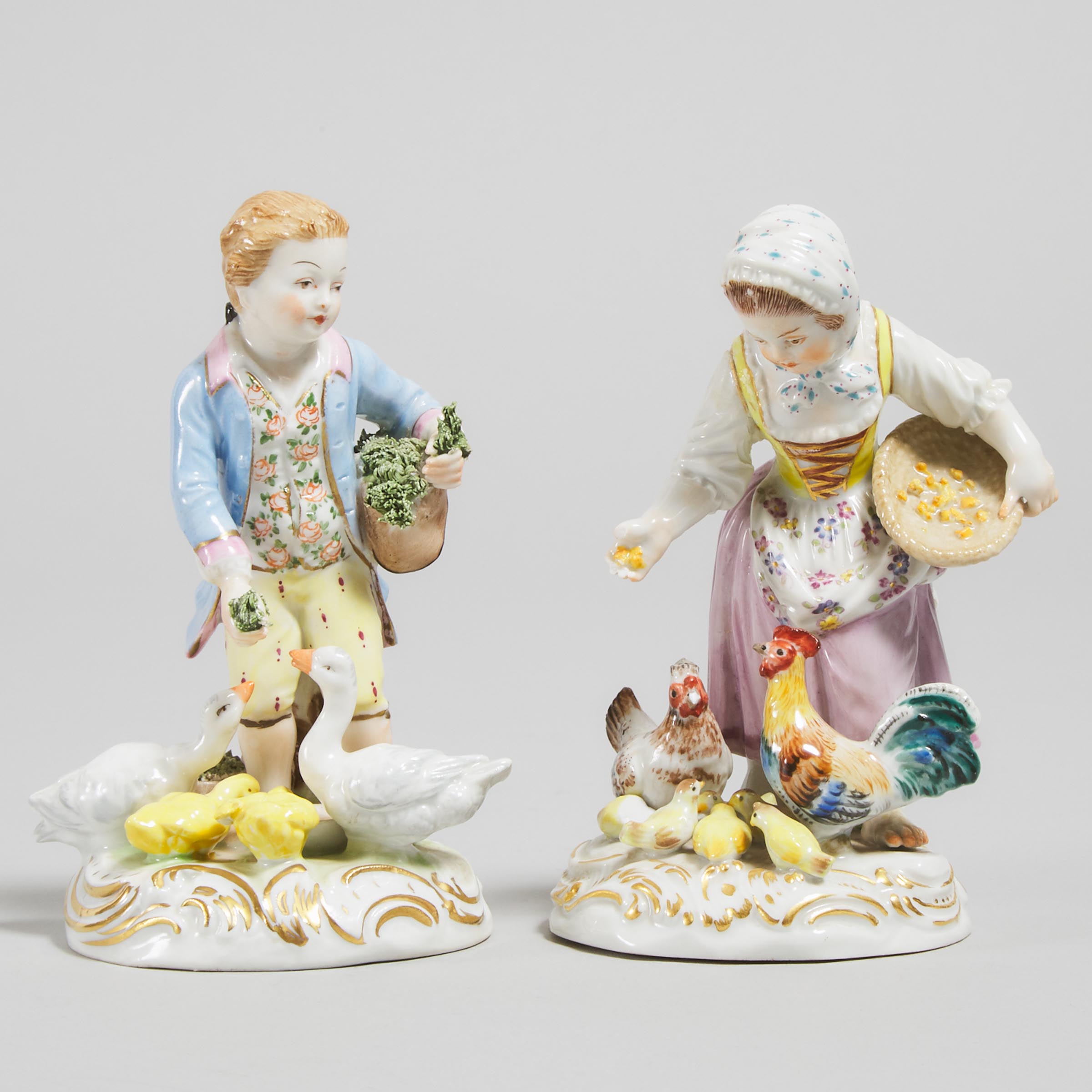 Meissen Model of a Girl Feeding Chickens, and a Dresden Companion, 20th century