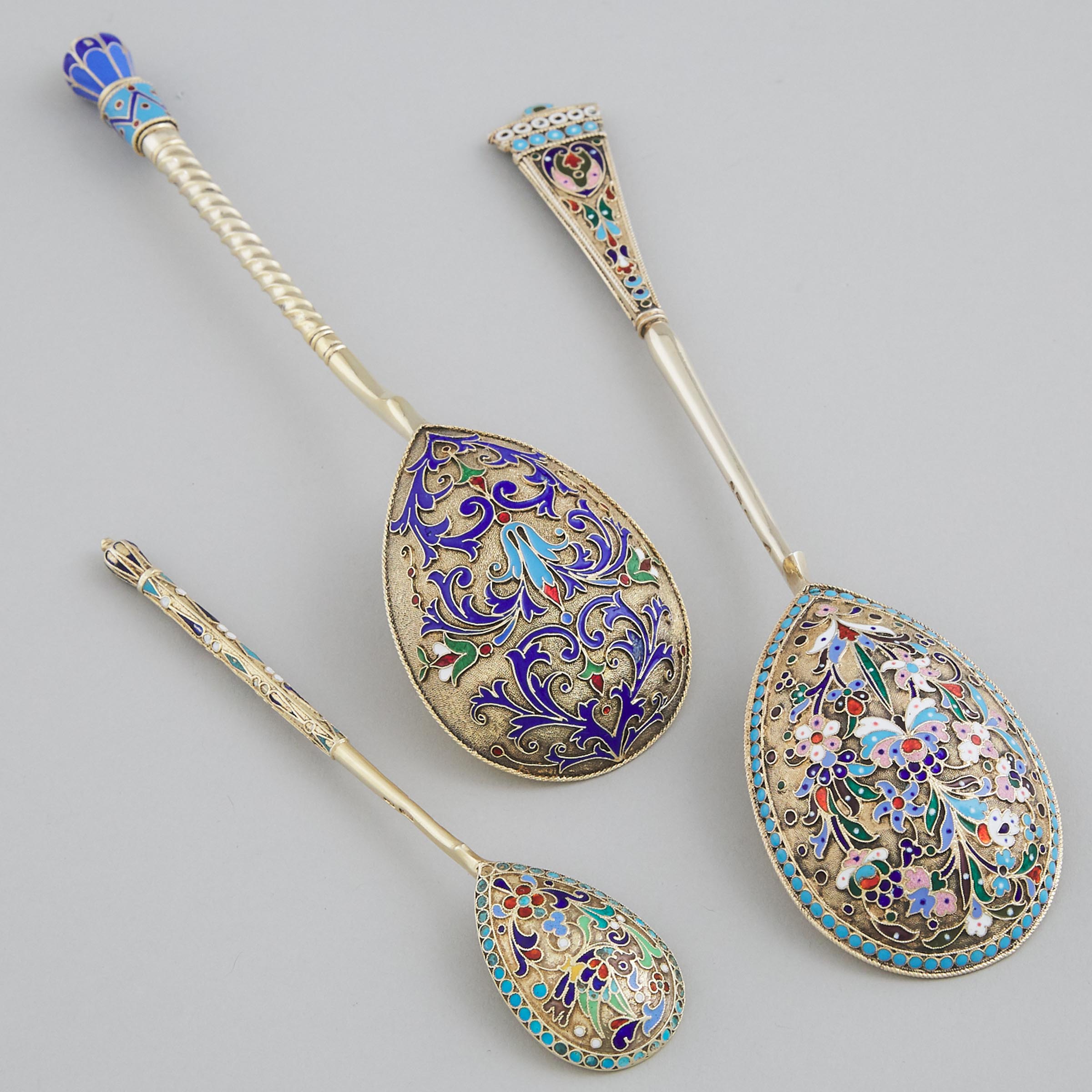 Three Russian Silver-Gilt and Cloisonné Enamel Spoons, Moscow and St. Petersburg, late 19th/early 20th century