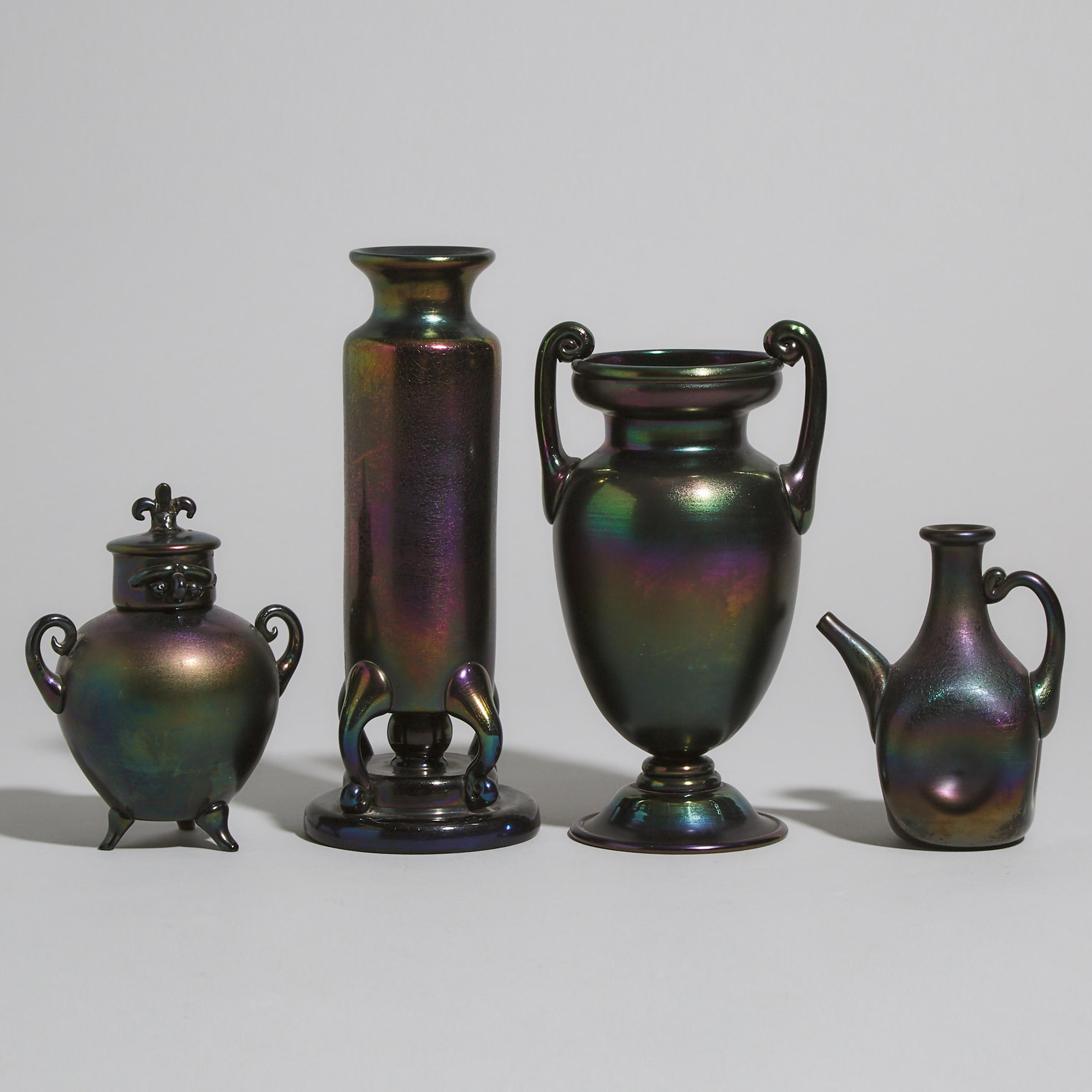 Two Iridescent Amethyst Glass Vases, Covered Vase, and a Jug, 20th century