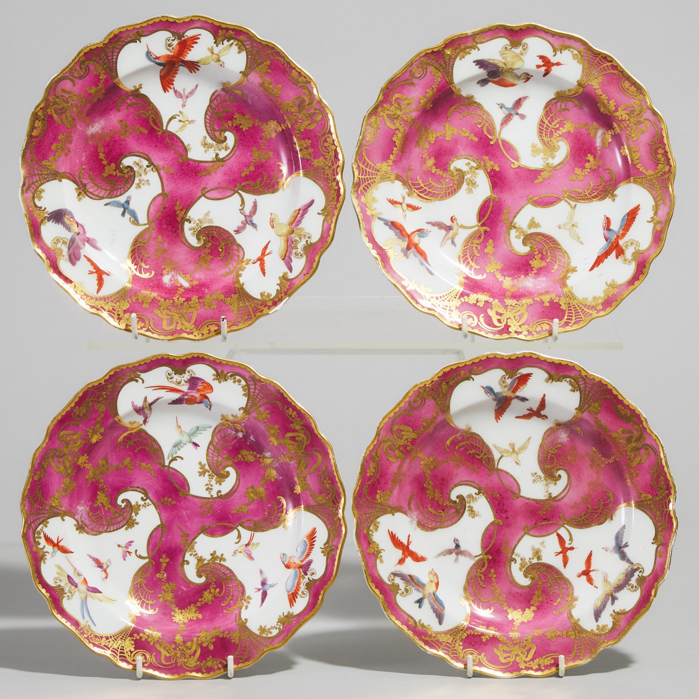 Four Chelsea Claret and Gilt Ground Plates, c.1765