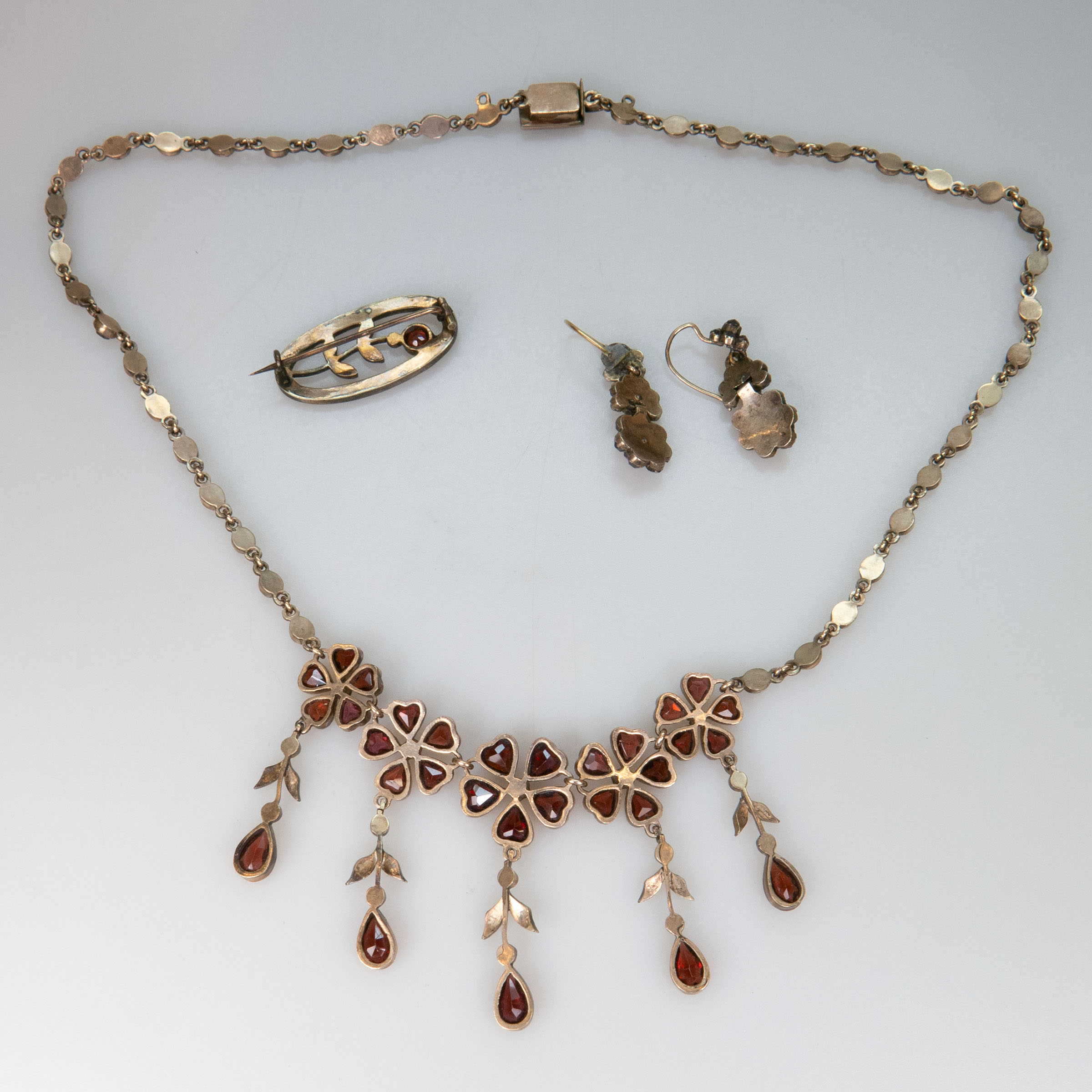 Small Quantity Of Silver Gilt And Garnet Jewellery