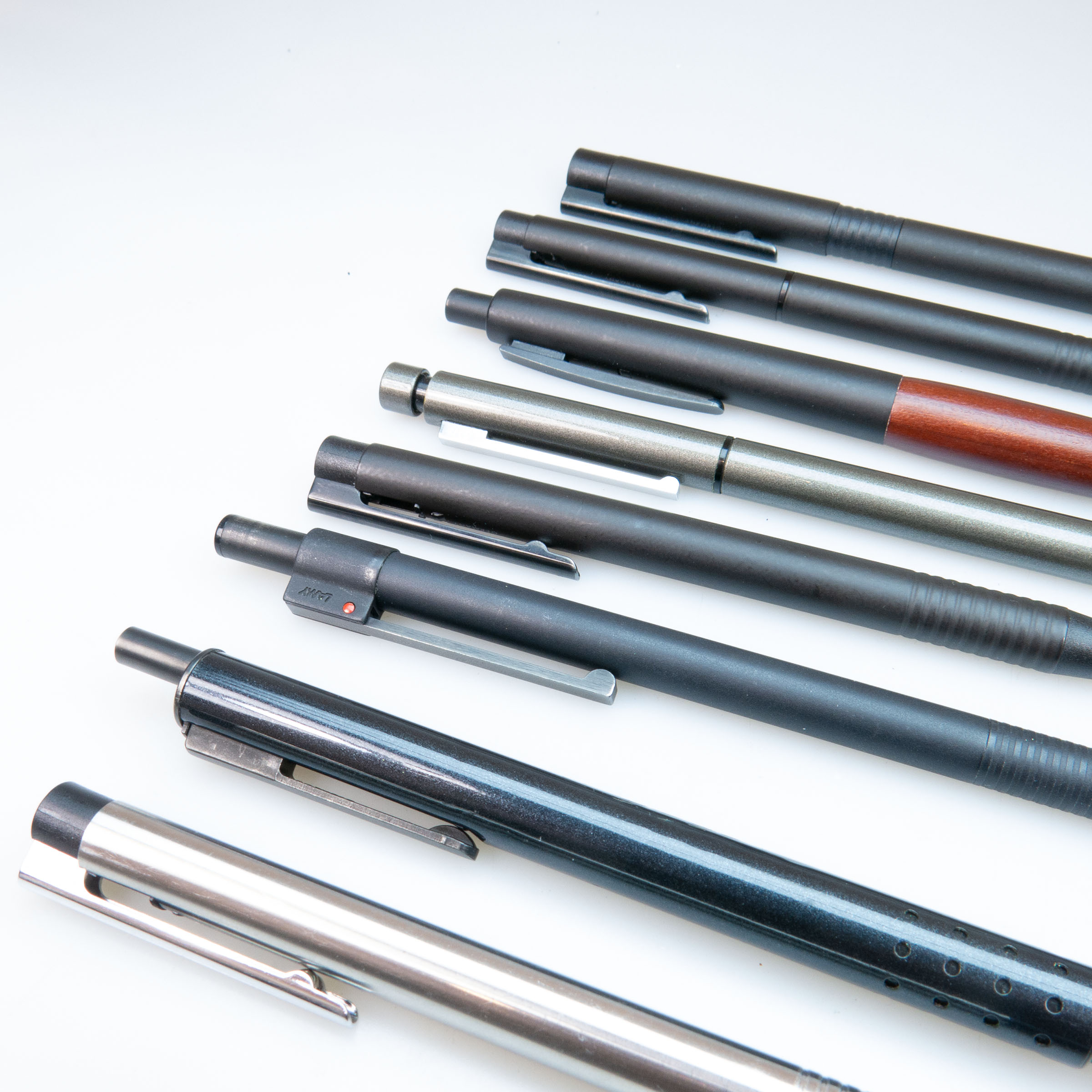 8 Various Lamy Ballpoint And Rollerball Pens