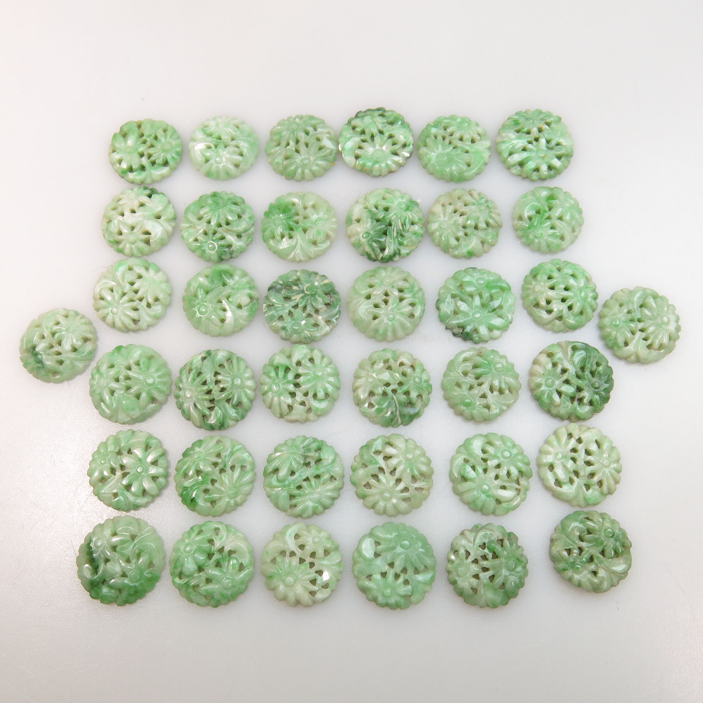 38 Carved And Pierced Circular Jadeite Panels