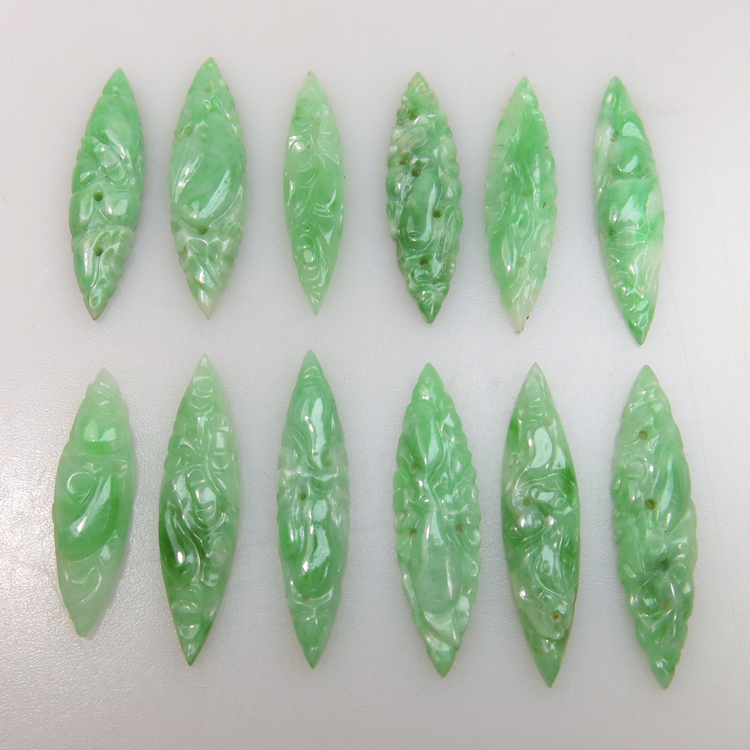 12 Carved And Pierced Navette Shaped Jadeite Panels