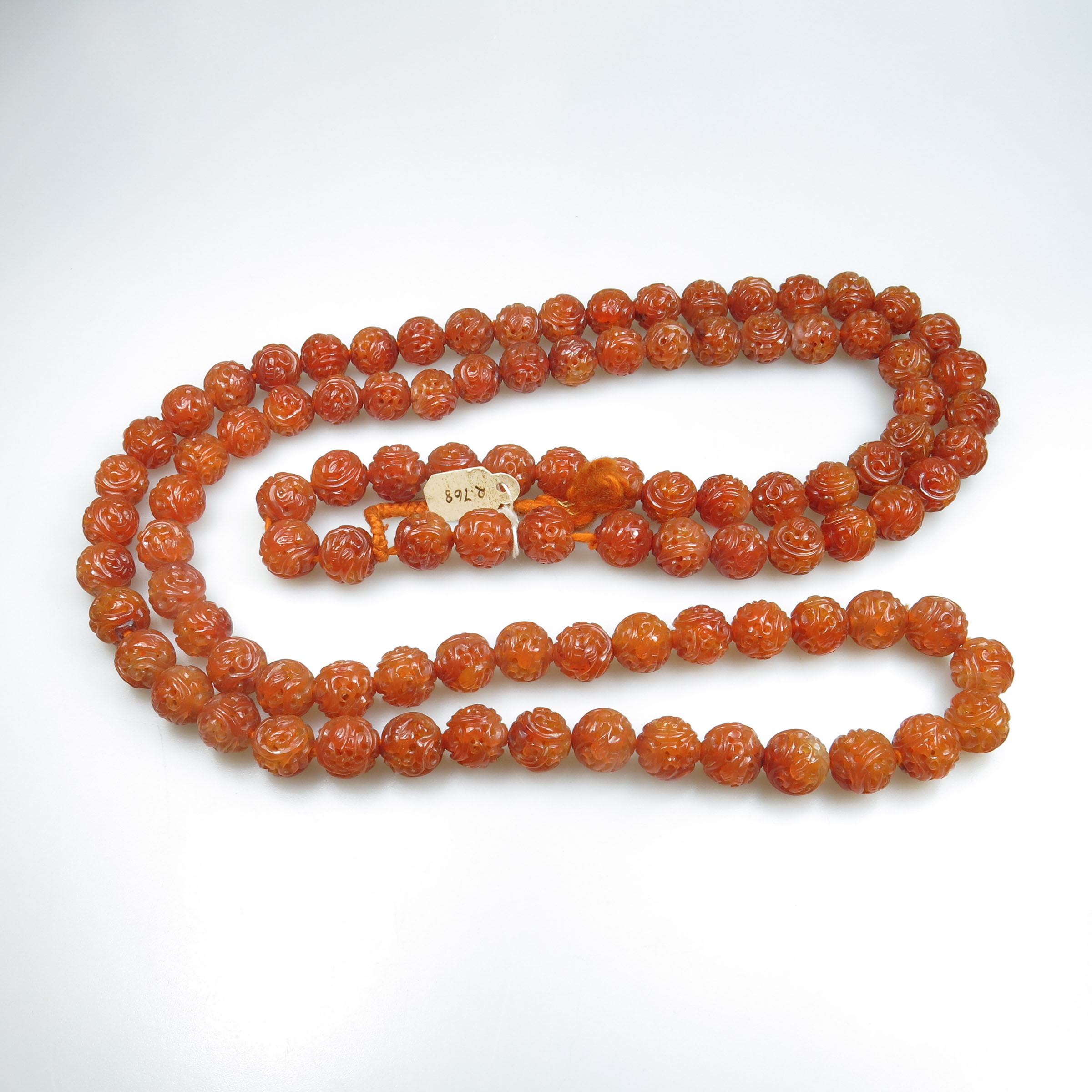 Single Strand Of Carved And Pierced Carnelian Beads