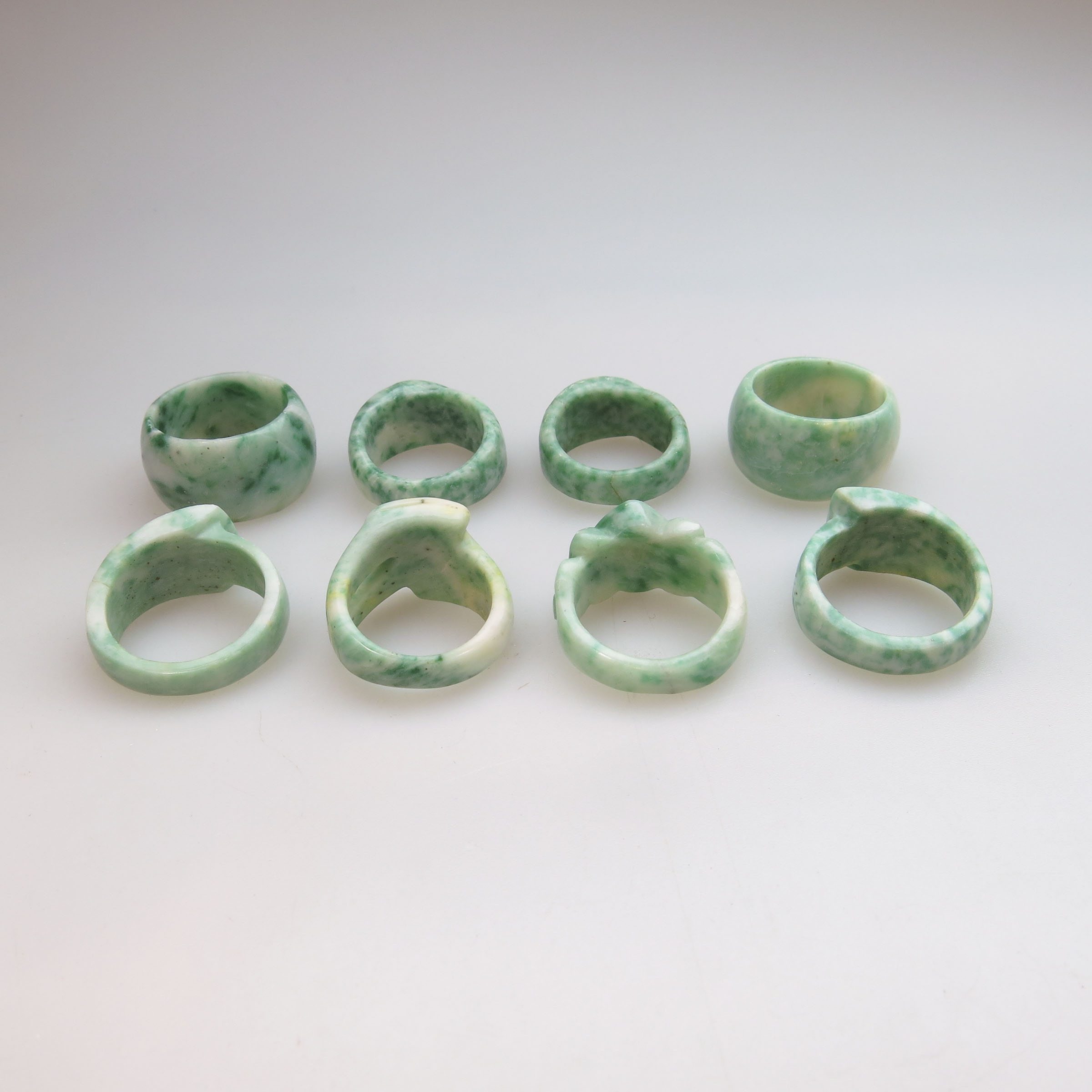 8 Various Carved 'Dishan Jade' Rings