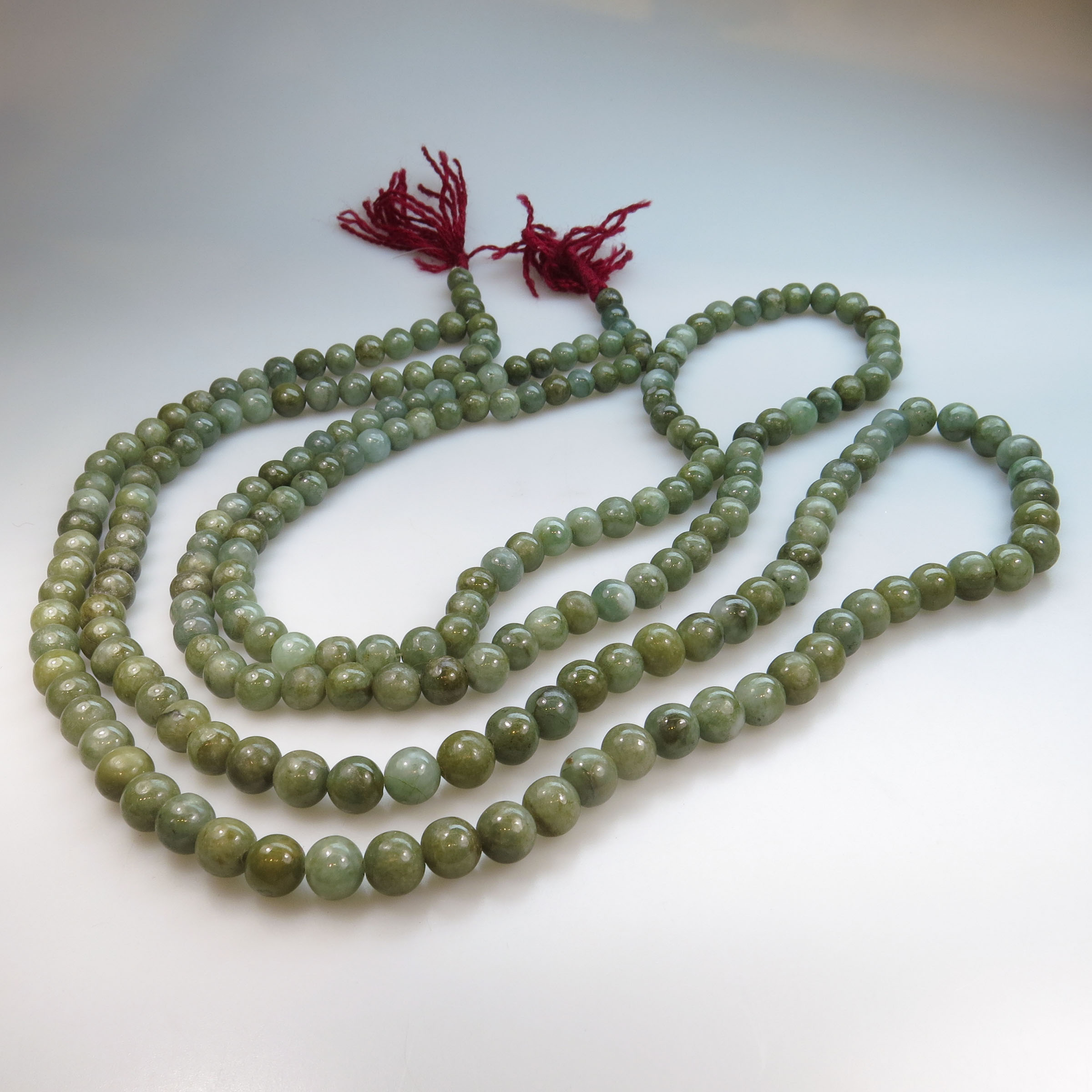 Two Single Strands Of Jade Beads