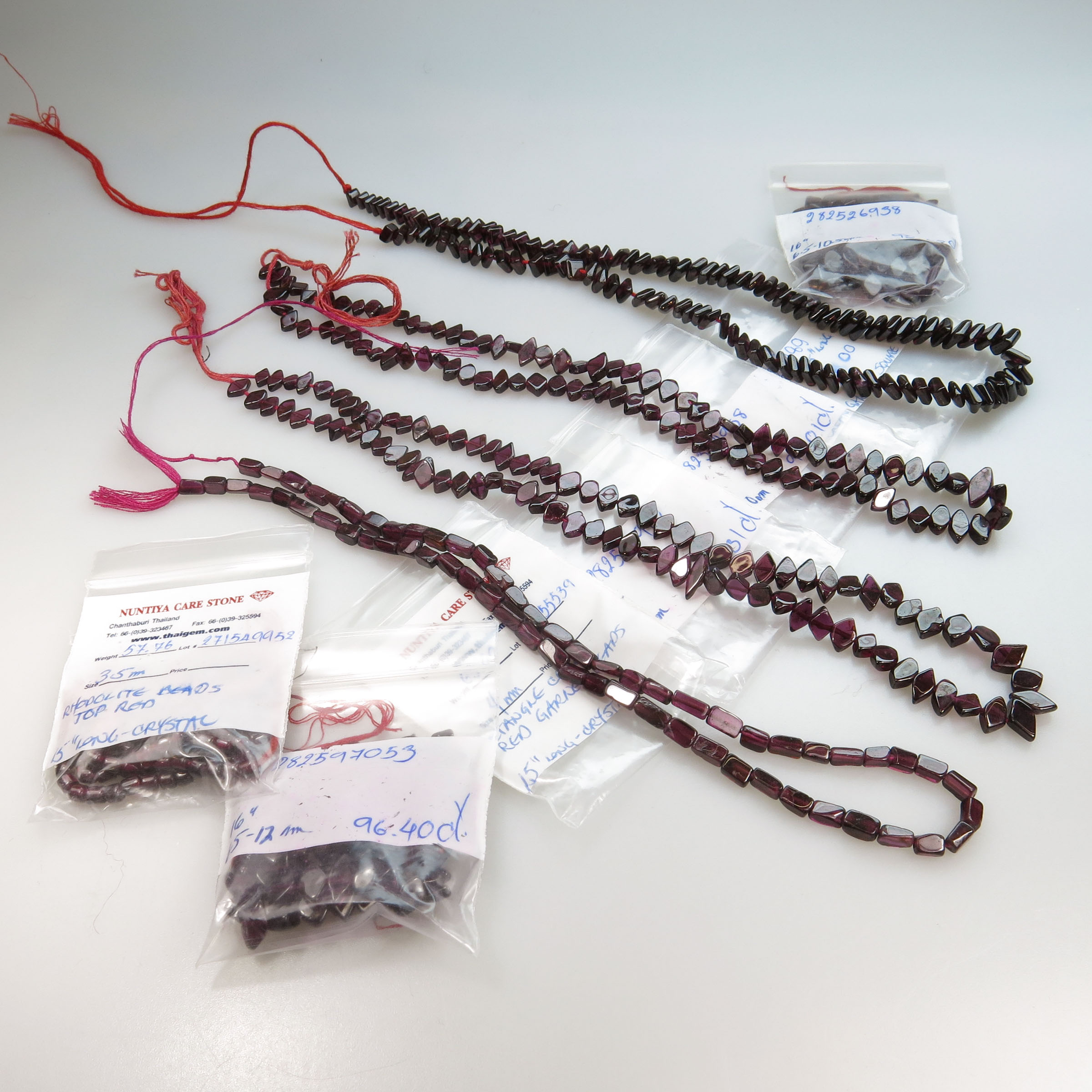 7 Various Strands Of Shaped Garnet Beads