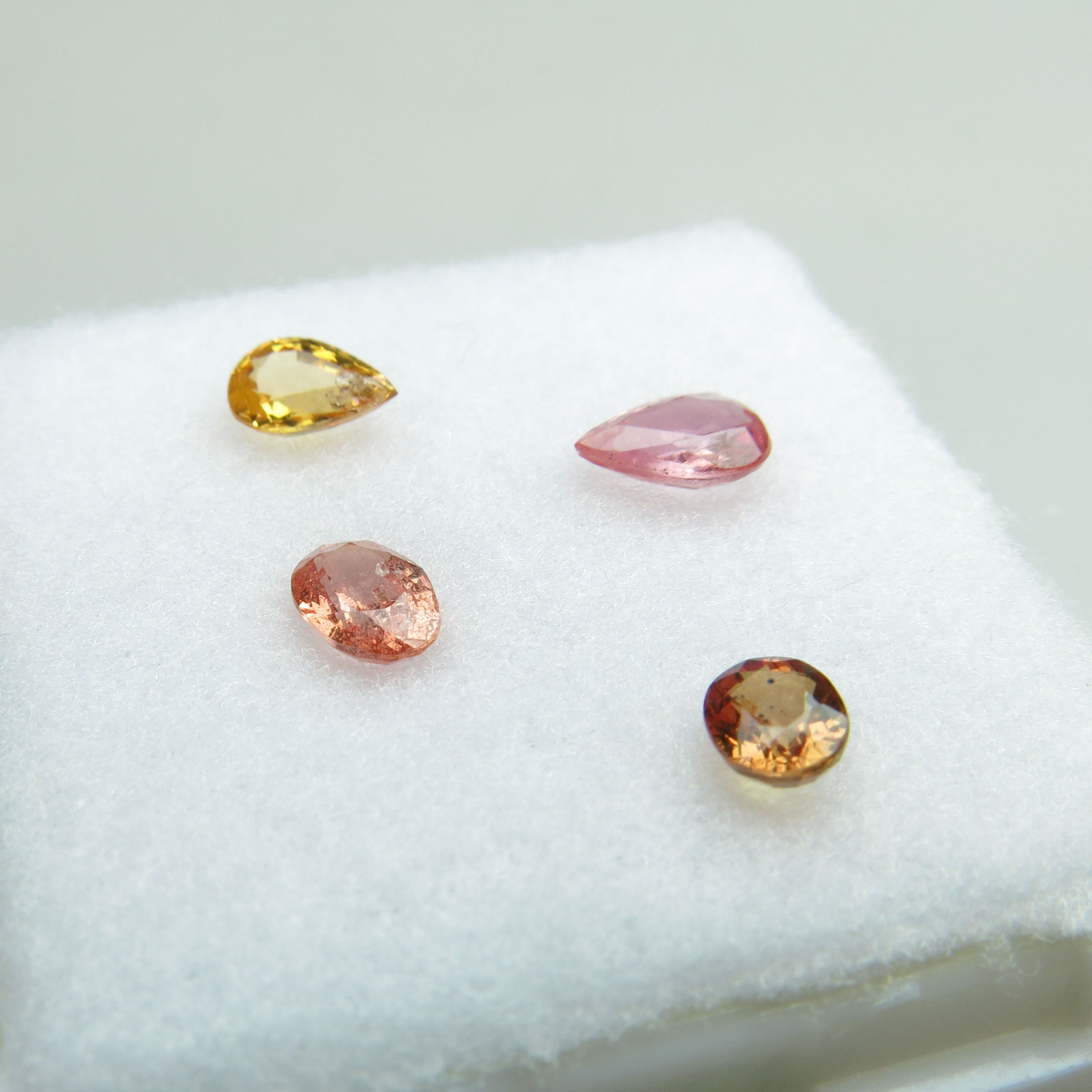 Four Pear And Oval Cut Padparadscha Sapphires