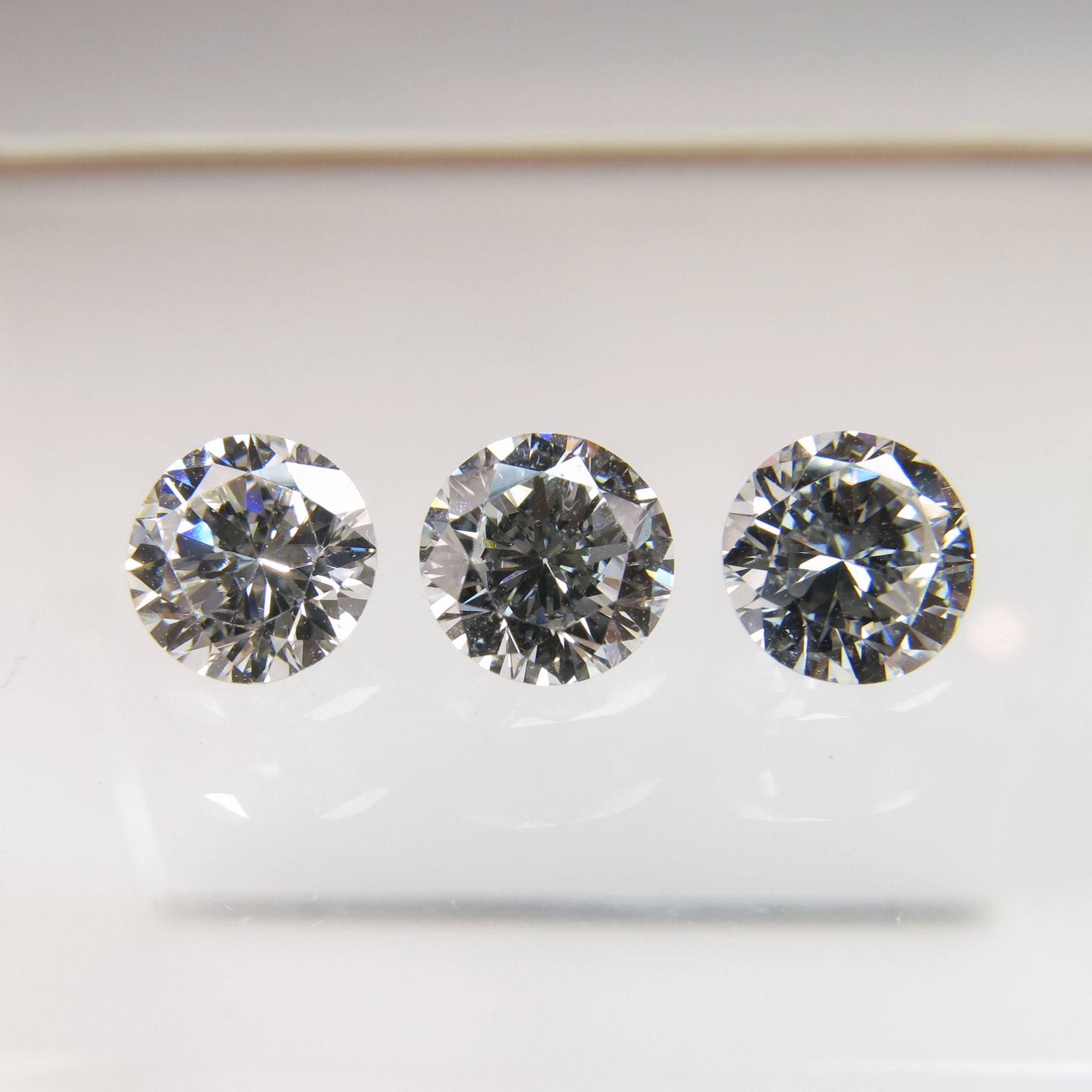 Three Unmounted Brilliant Cut Diamonds