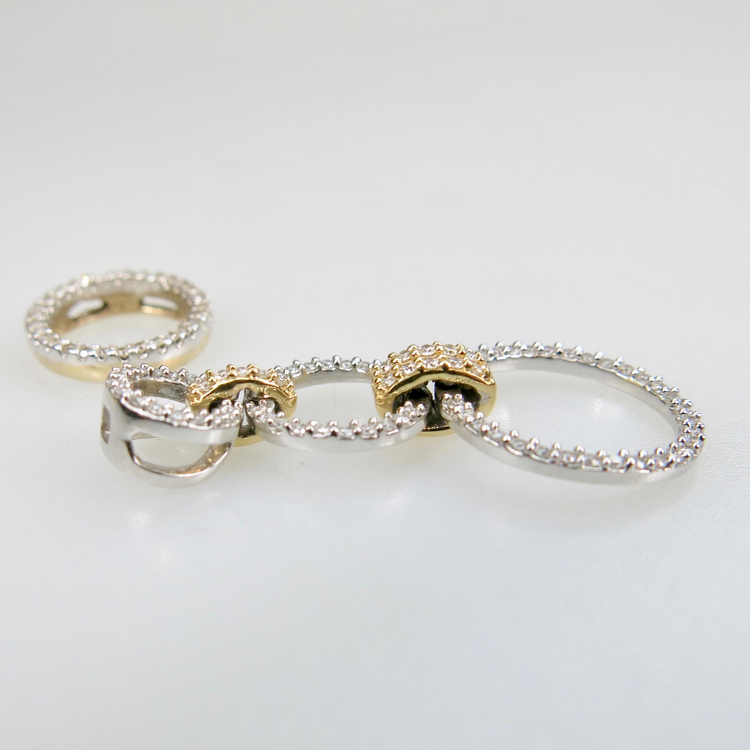 Small Quantity Of Yellow And White Gold Jewellery