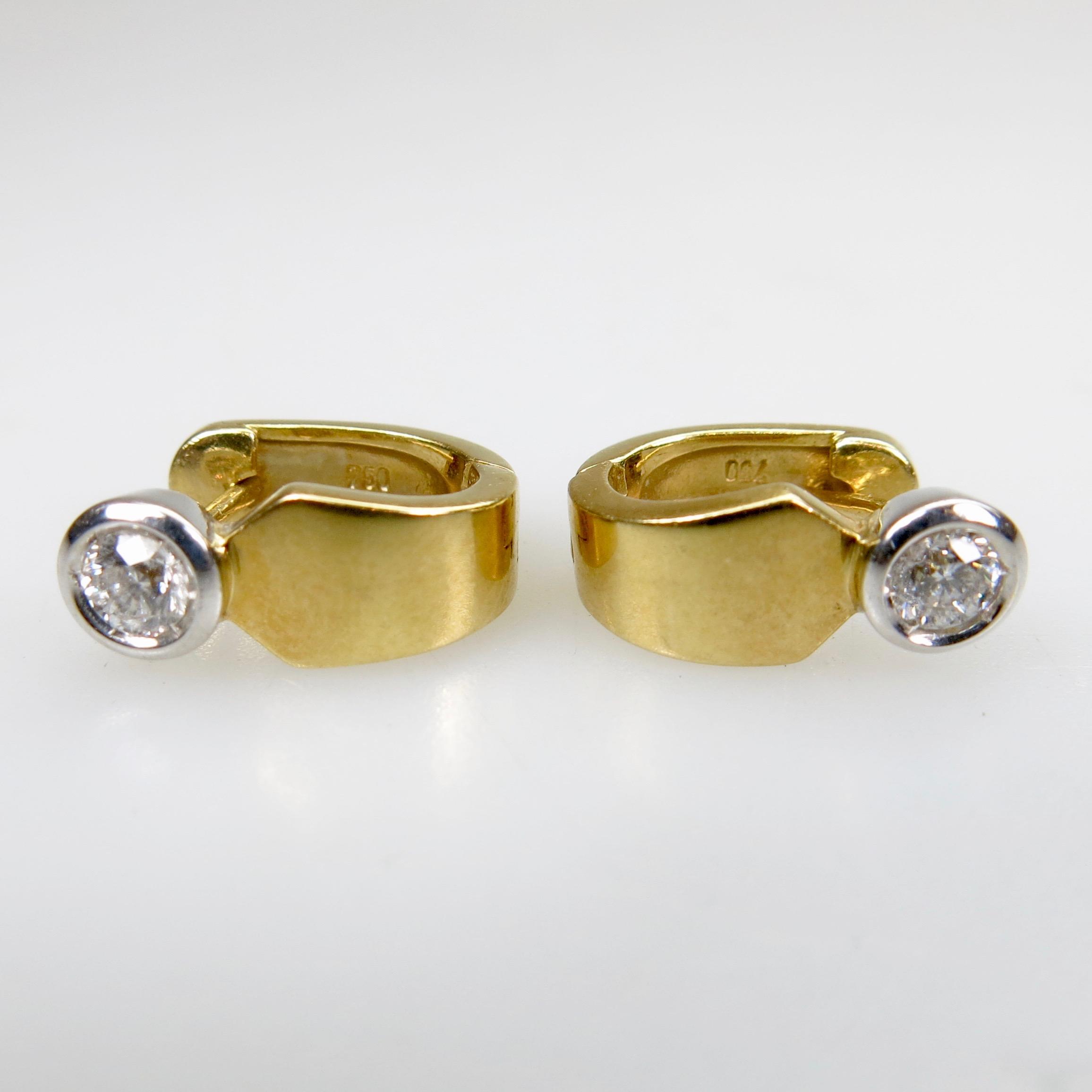 Pair Of 18k Yellow And White Gold Hinged Earrings