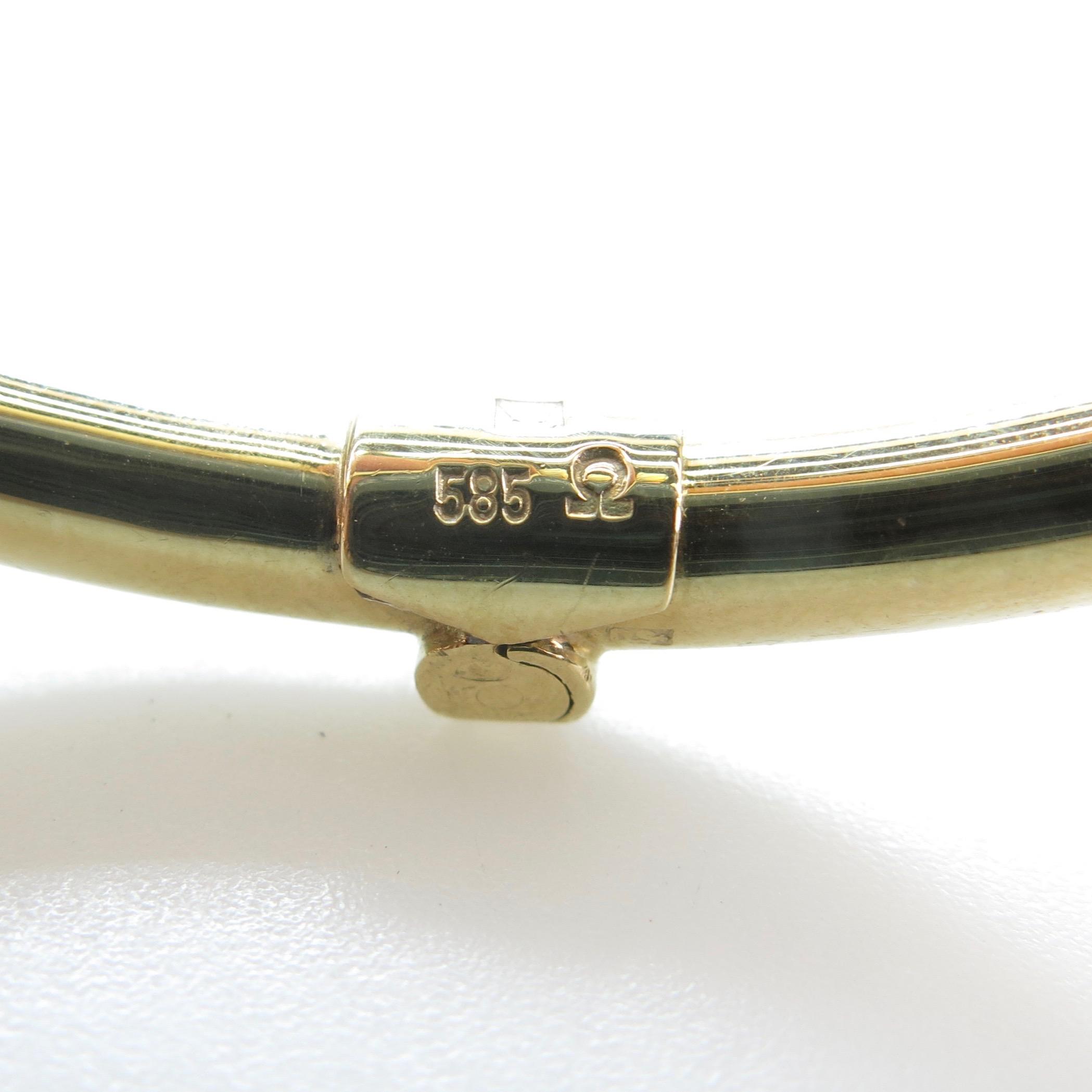 14k Yellow Gold Cross-Over Spring Hinged Bangle