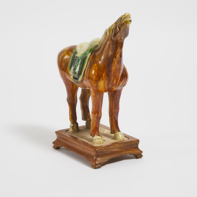A Tang Style Sancai-Glazed Pottery Figure of a Horse