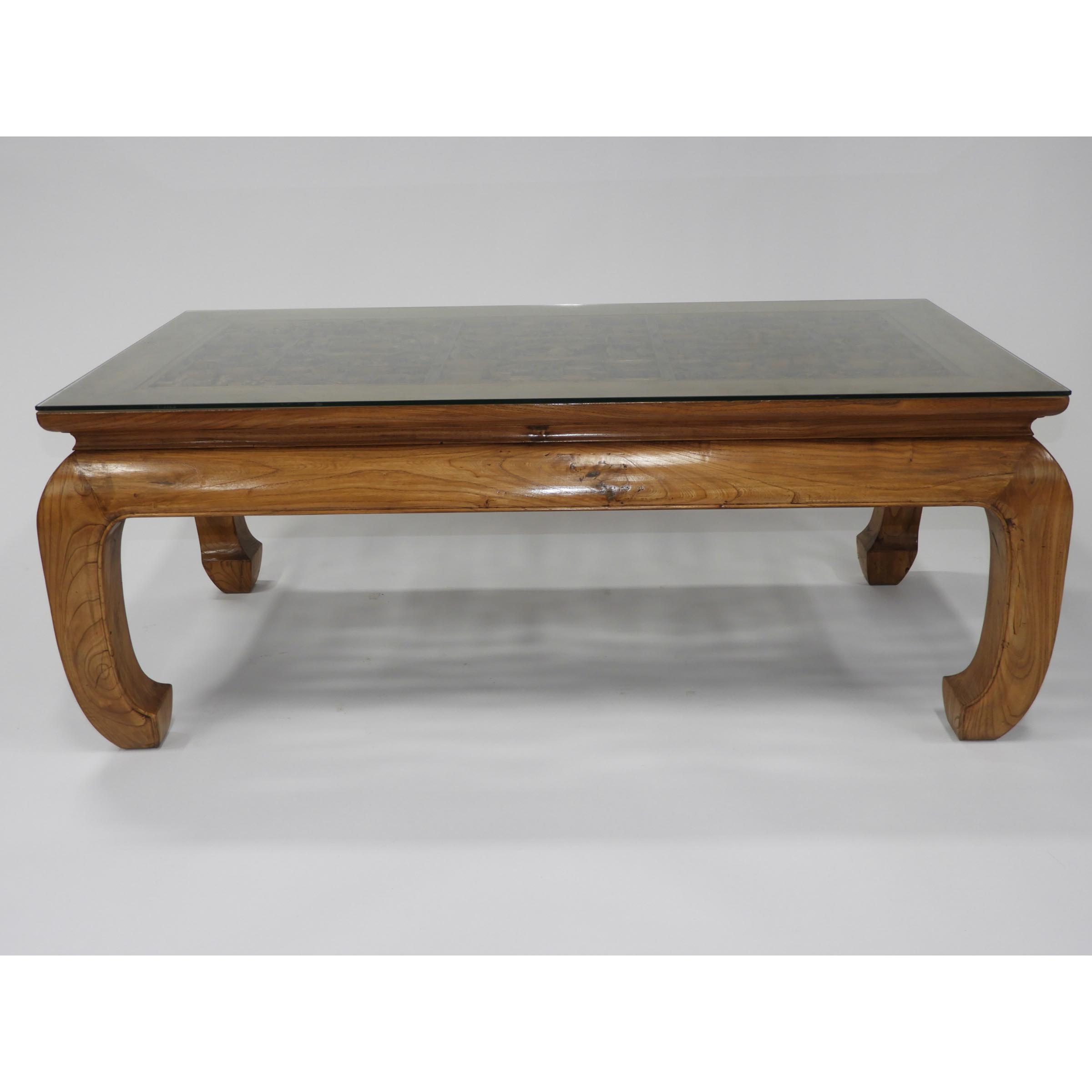 A Chinese Elmwood Table with Carved Top