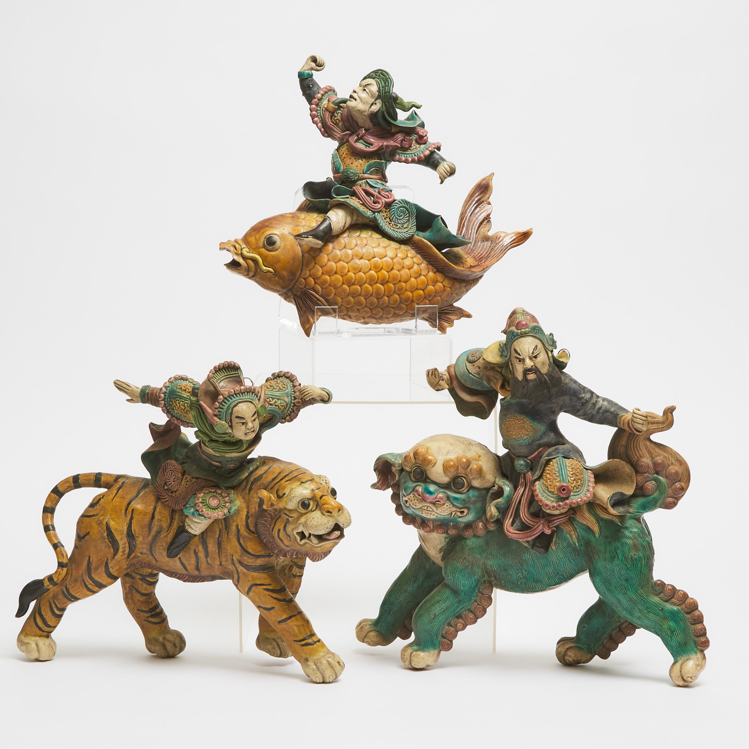 A Group of Three Sancai-Glazed Pottery Tile Warriors Riding Beasts, Early 20th Century