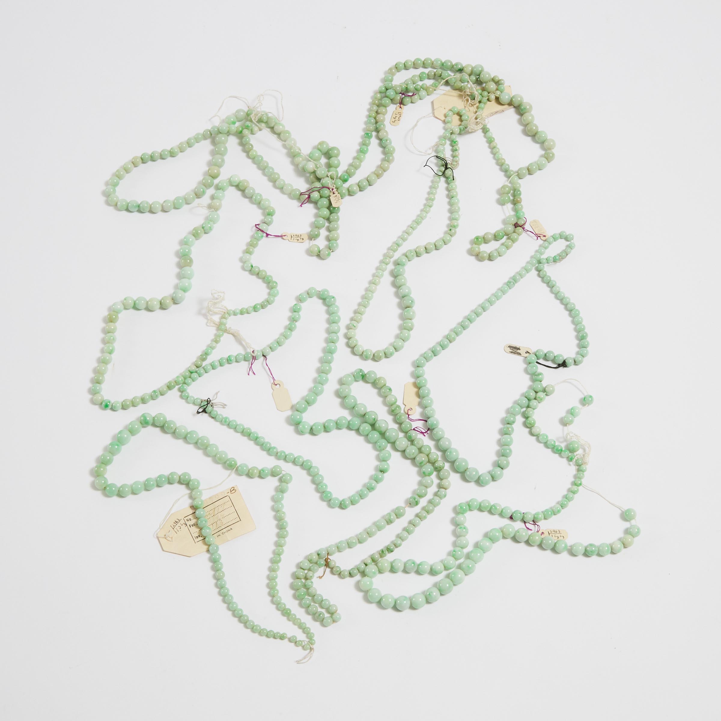 A Group of Nine Graduated Strands of Jadeite Beaded Necklaces 