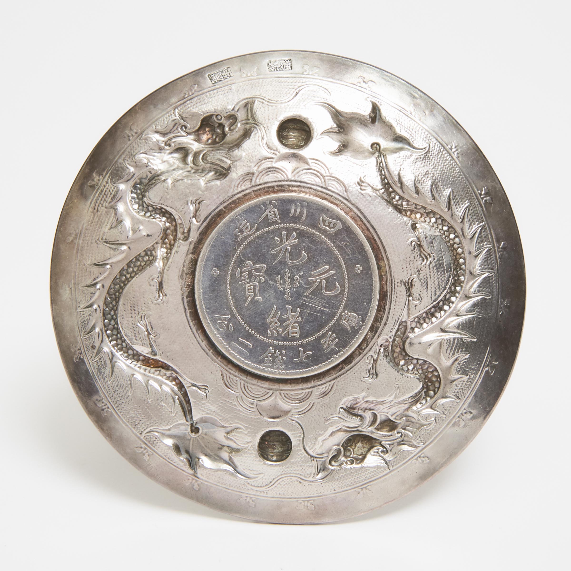 A Guangxu Sichuan Silver Dollar Mounted Silver Dish