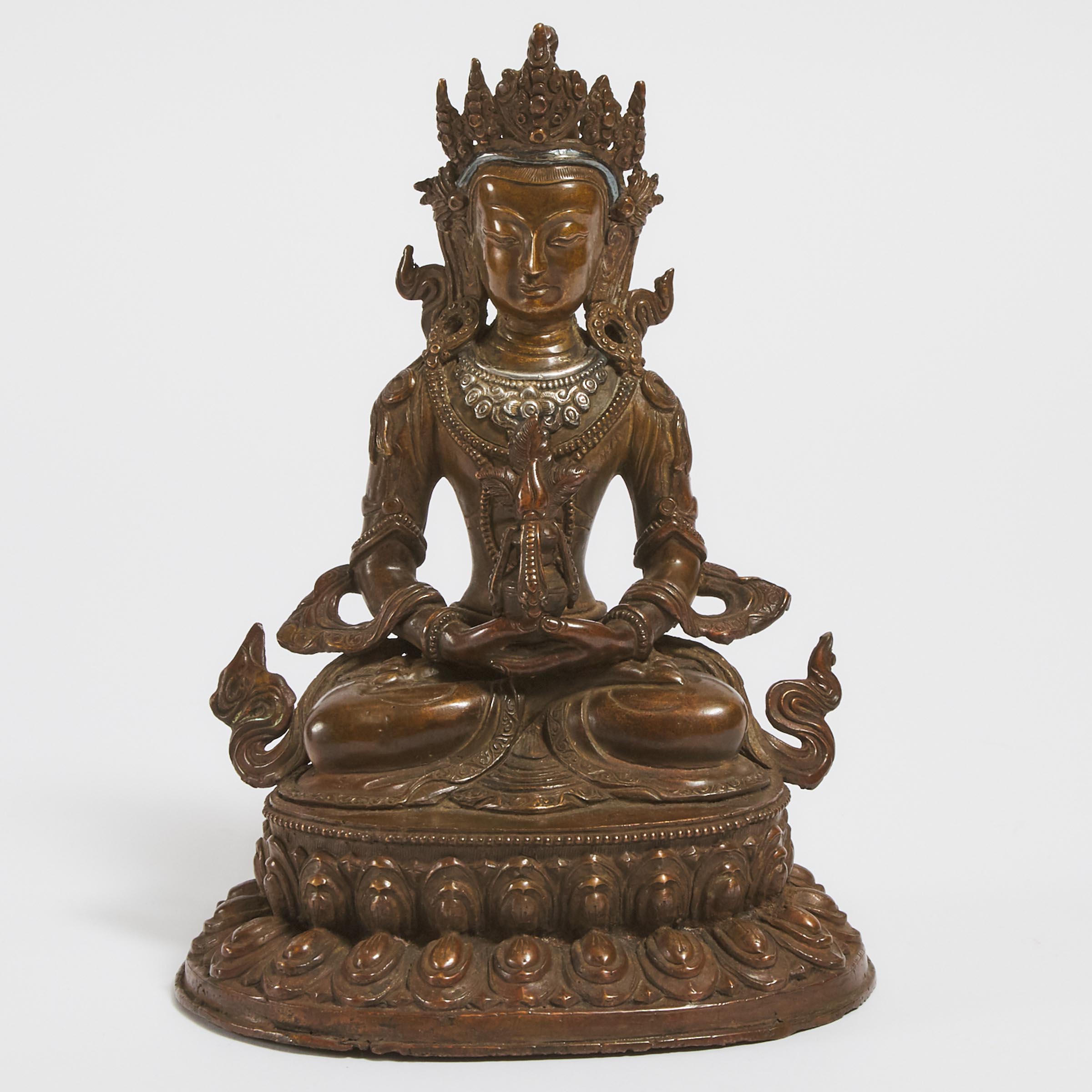 A Silver-Inlaid Bronze Figure of Amitabha Buddha, Tibet/Nepal