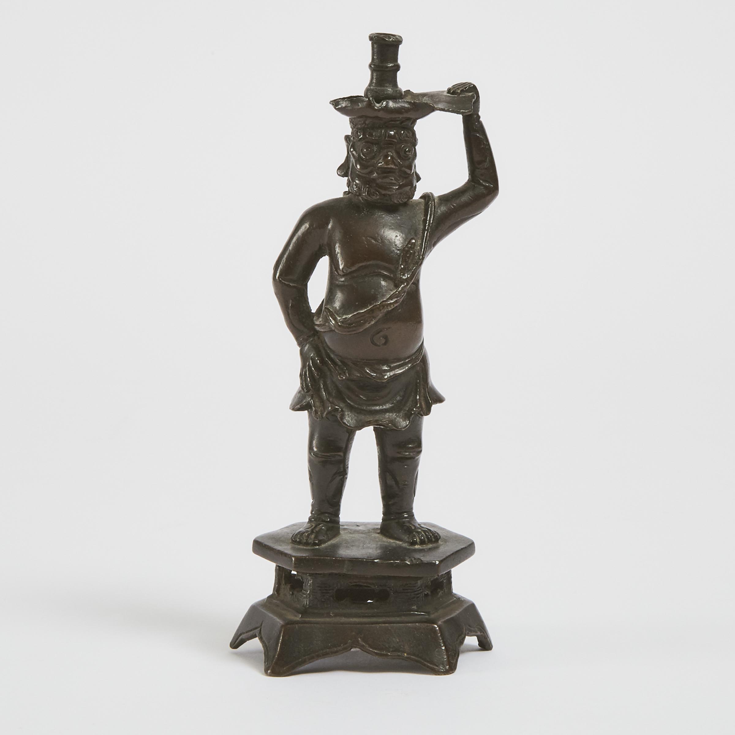 A Bronze 'Foreigner' Candlestick, Ming Dynasty, 17th Century
