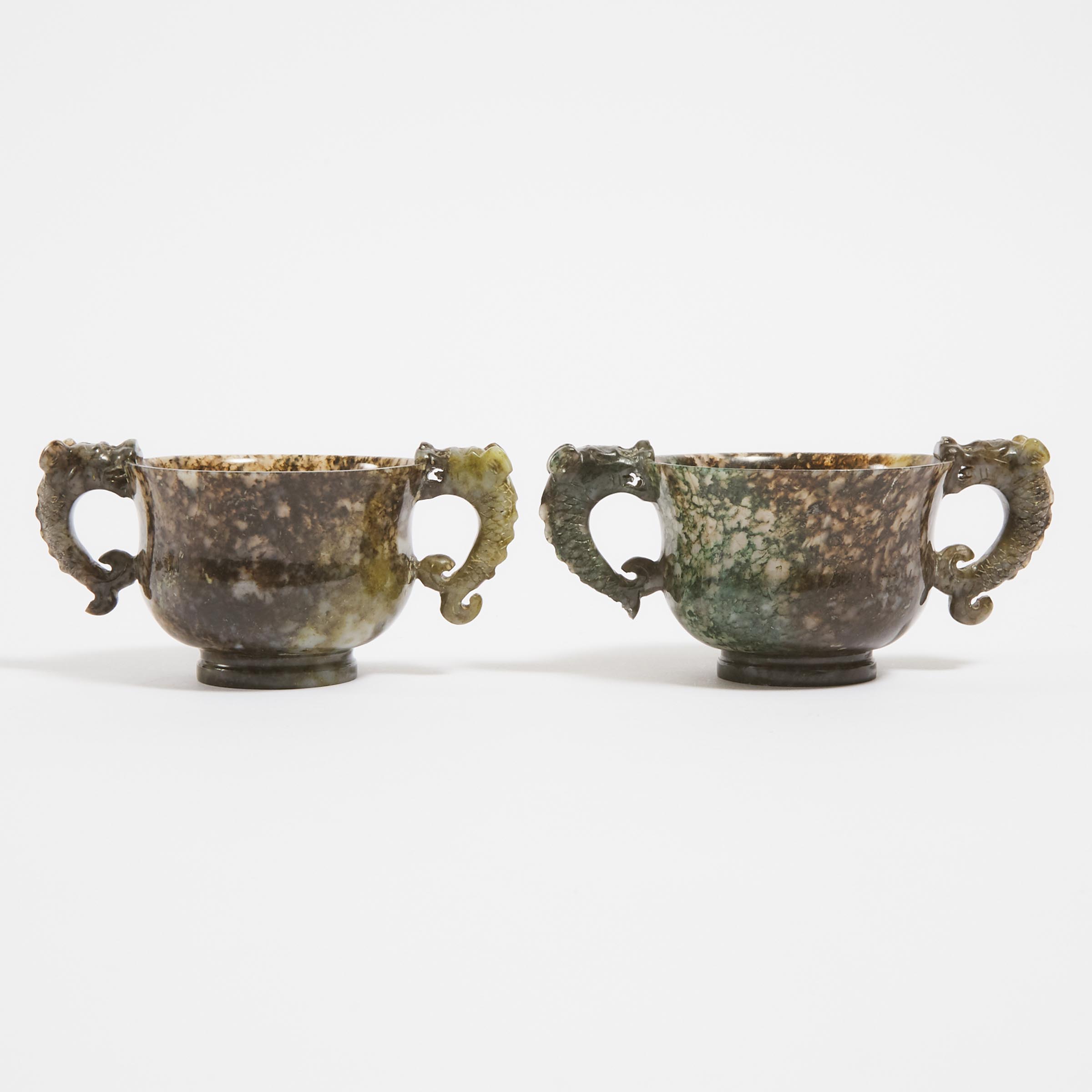 A Pair of Carved Moss Agate 'Dragon-Fish' Handled Cups, Early 20th Century