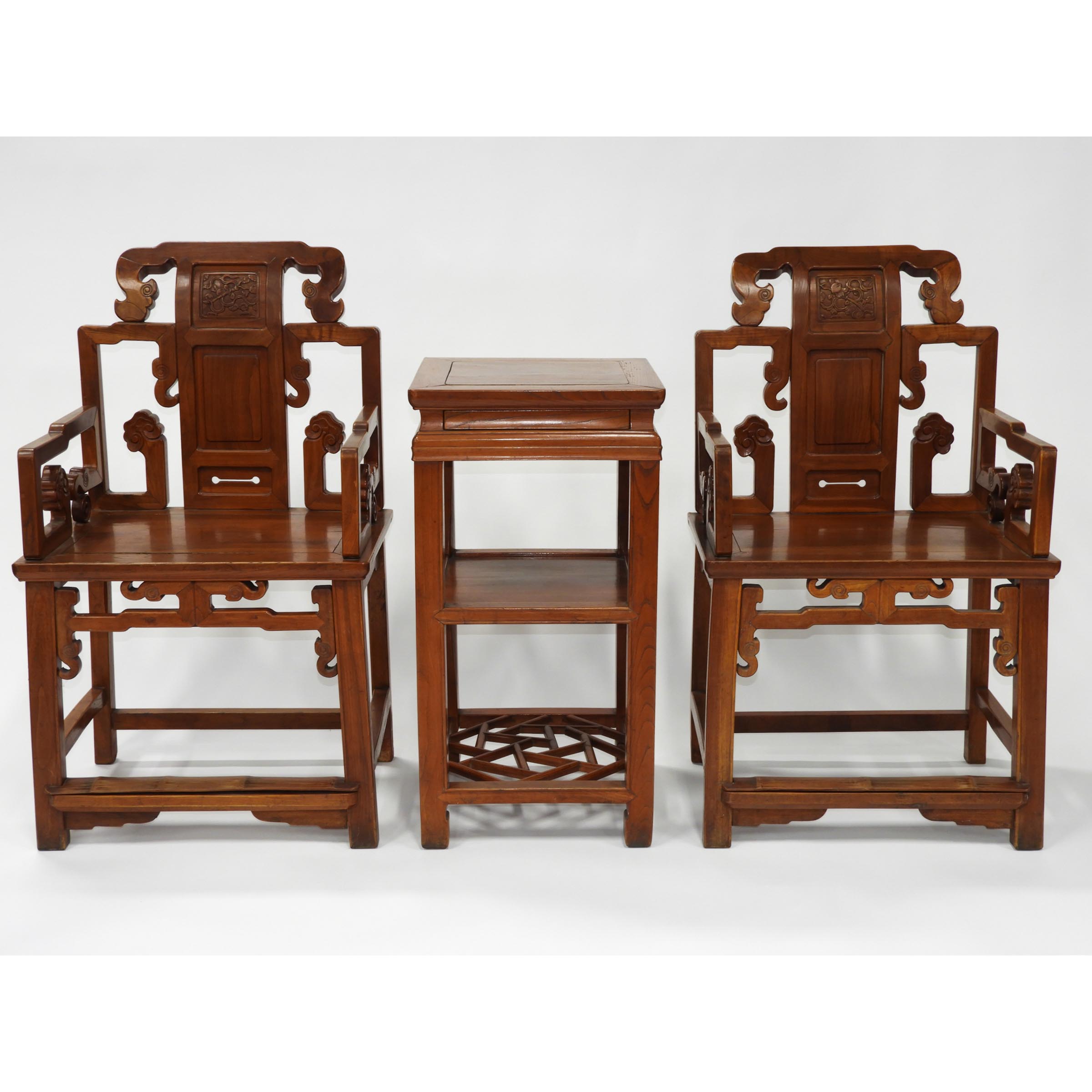A Chinese Hardwood Table and Two Chairs