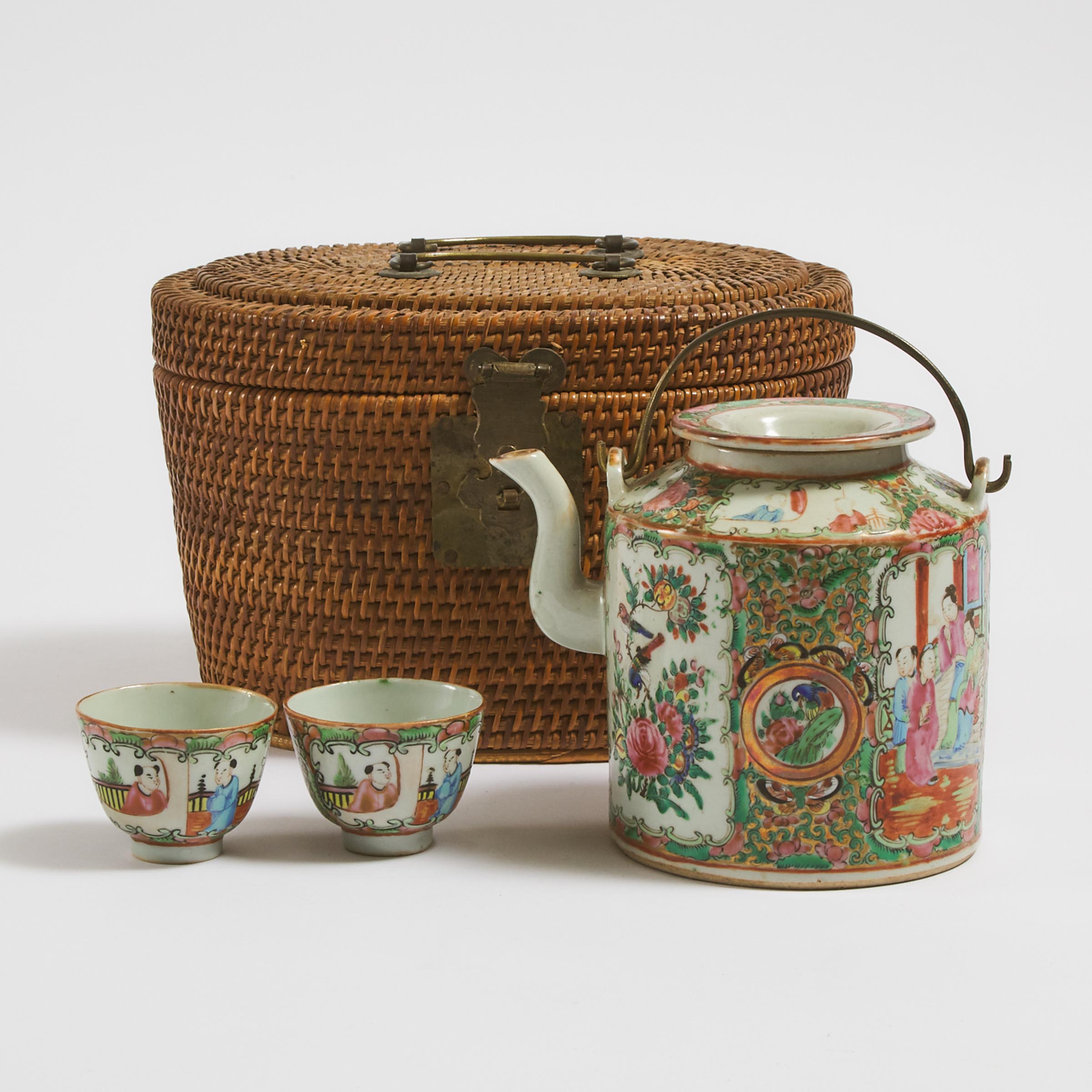 A Canton Famille Rose Set of Two Teacups and a Teapot, Together With a Bamboo Storage Basket, Circa 1930