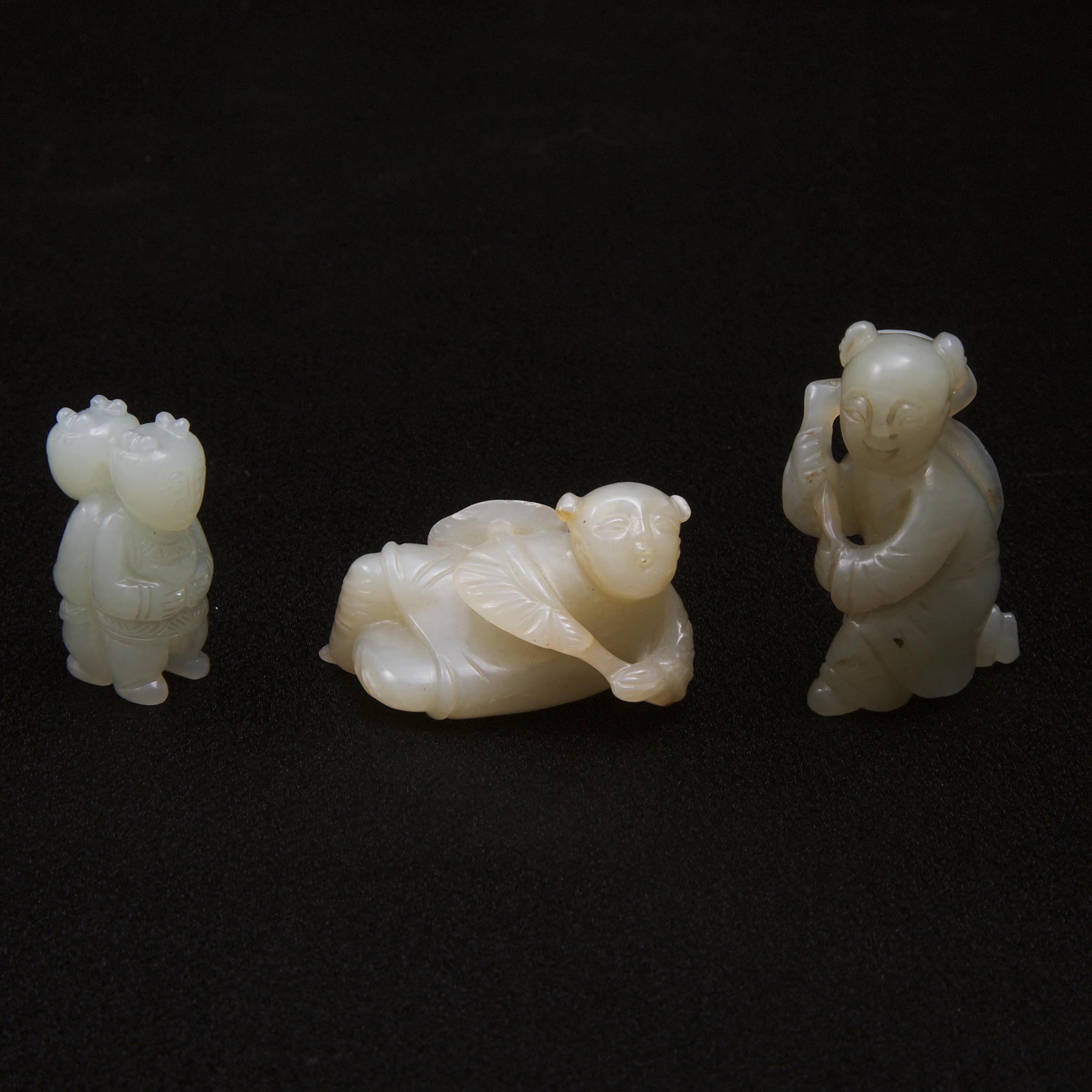 A Group of Three White Jade Carvings of Boys